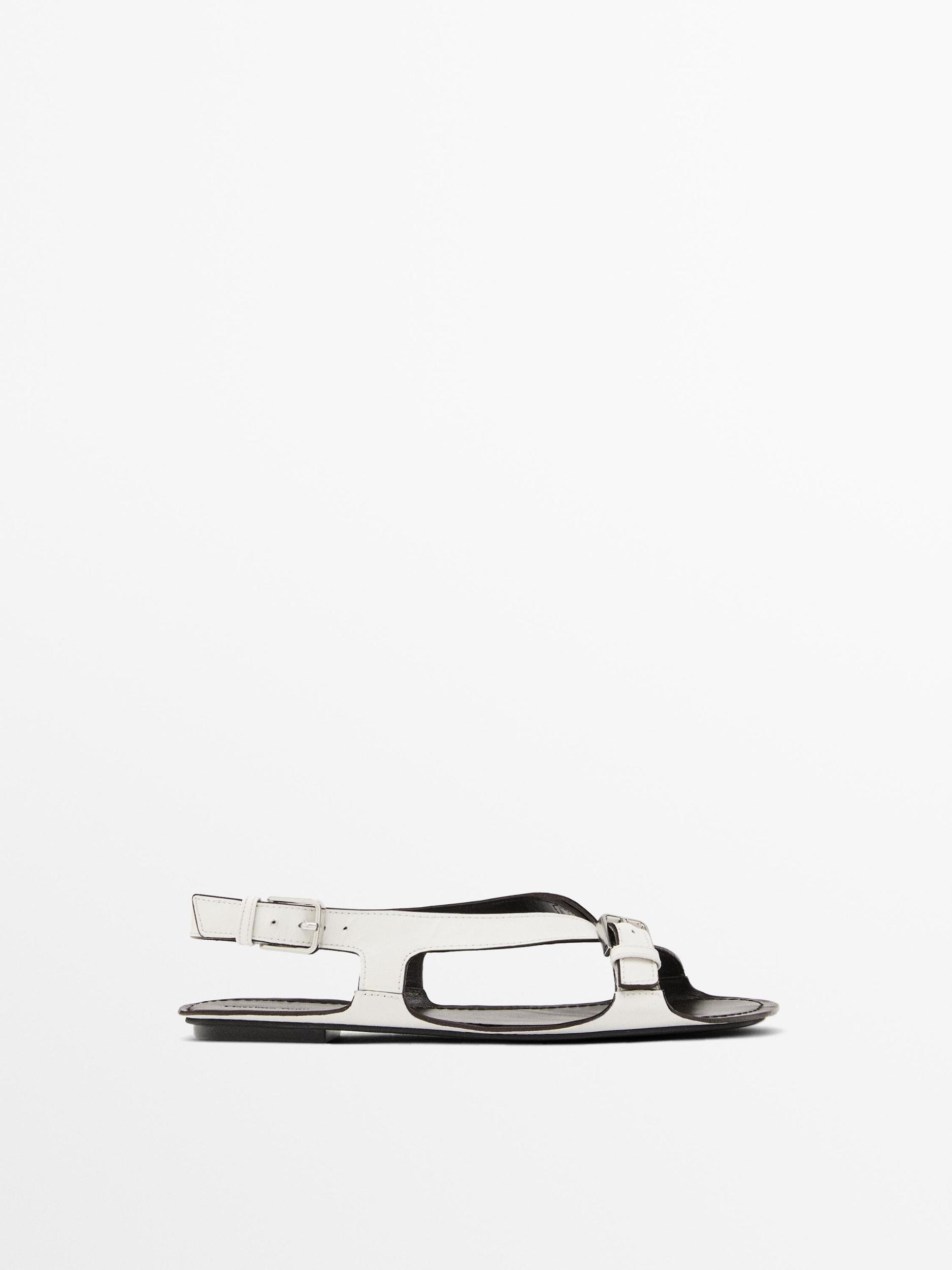 Flat leather sandals with buckles Product Image
