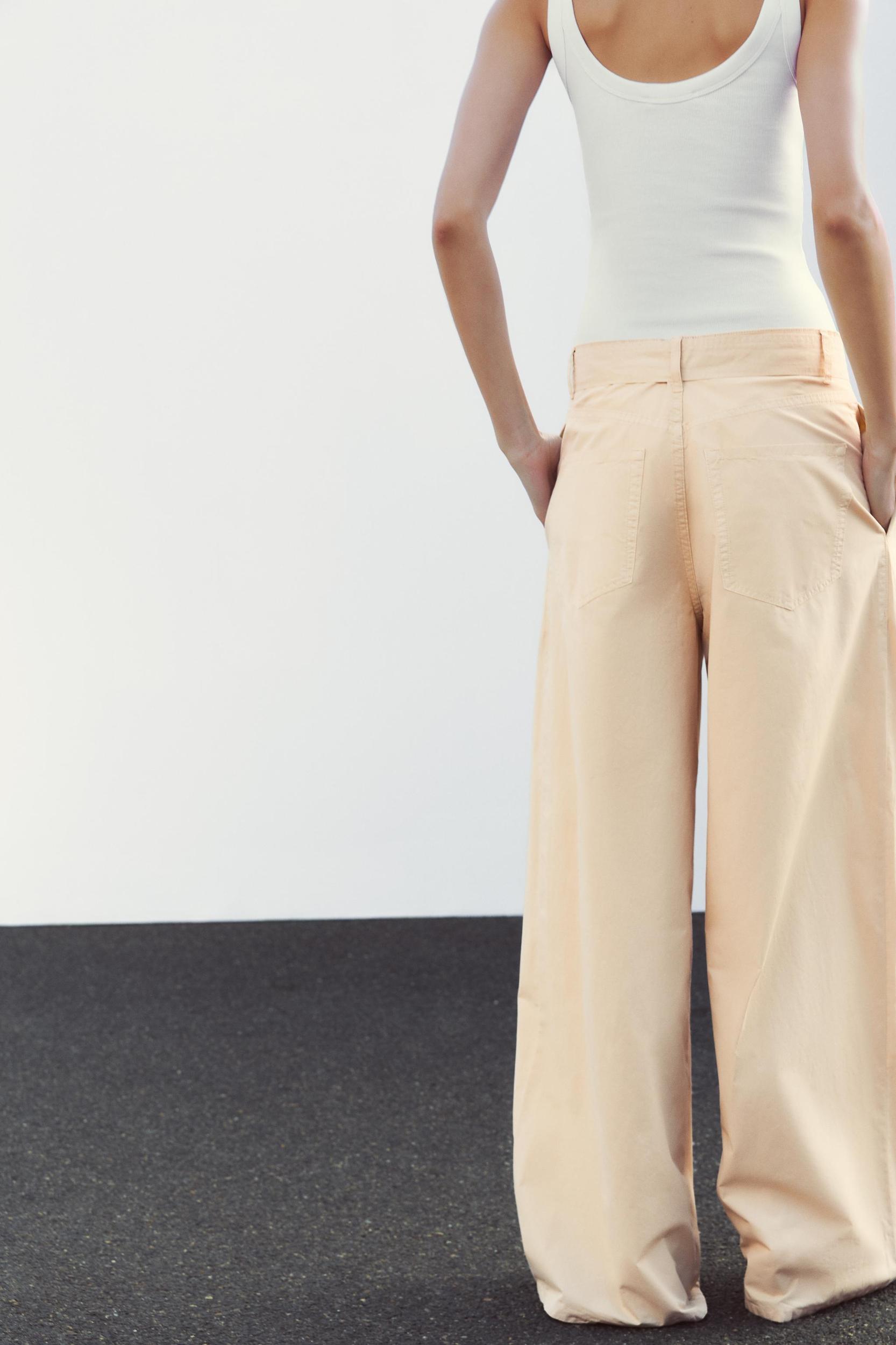 PLEATED BELTED PANTS Product Image