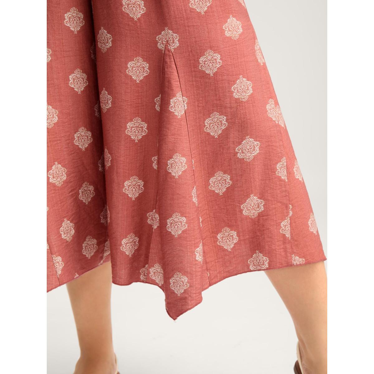 Plus Size Boho Print Irregular Hem Flare Pants Women Crepe Boho Bootcut Mid Rise Vacation Pants BloomChic 12/L Product Image