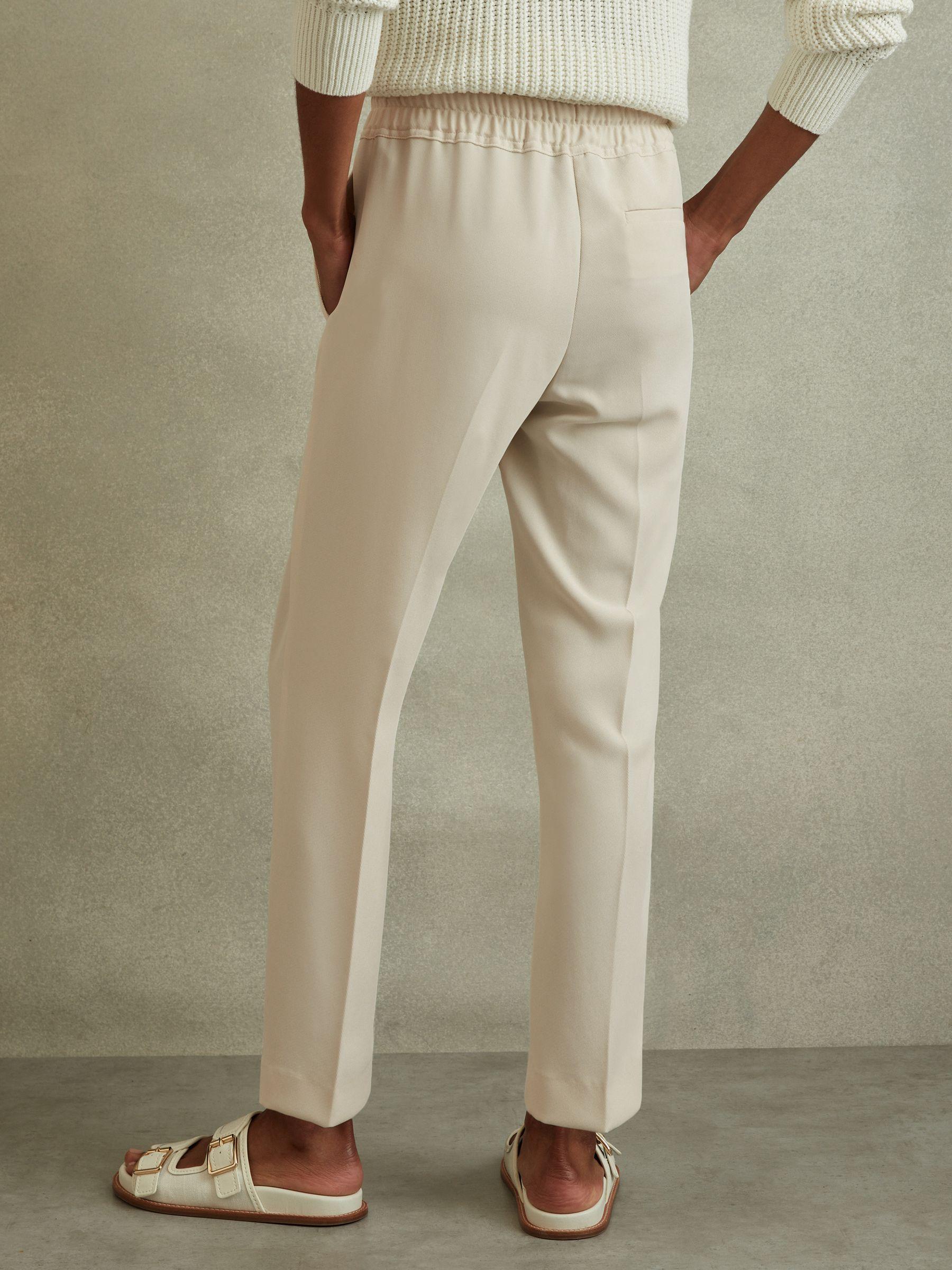 Tapered Pull On Trousers in Cream Product Image