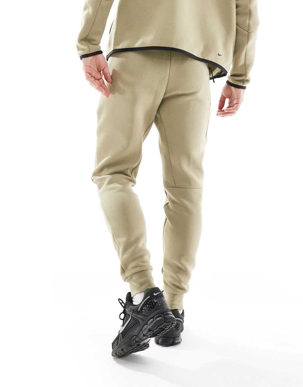 Nike Tech Fleece cuffed sweatpants in khaki Product Image