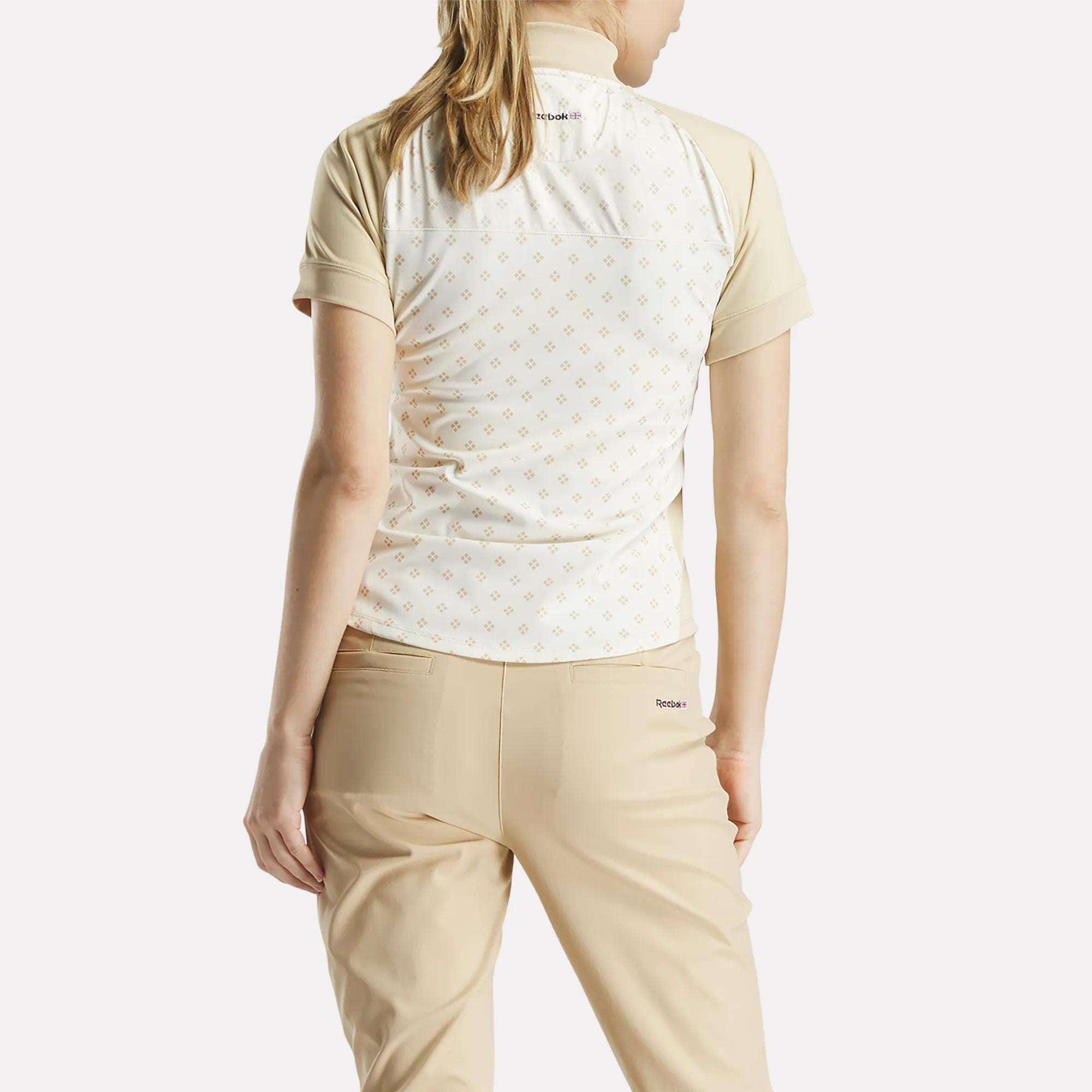 Women's Short Sleeve 1/4 Zip Mini Argyle Print Top Female Product Image