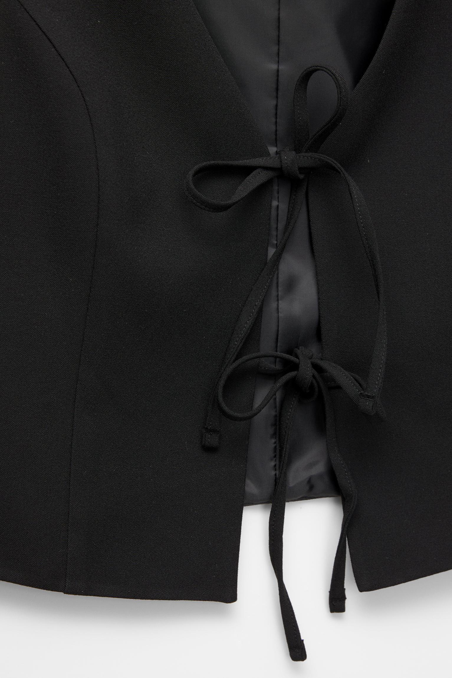 Vest with ties Product Image