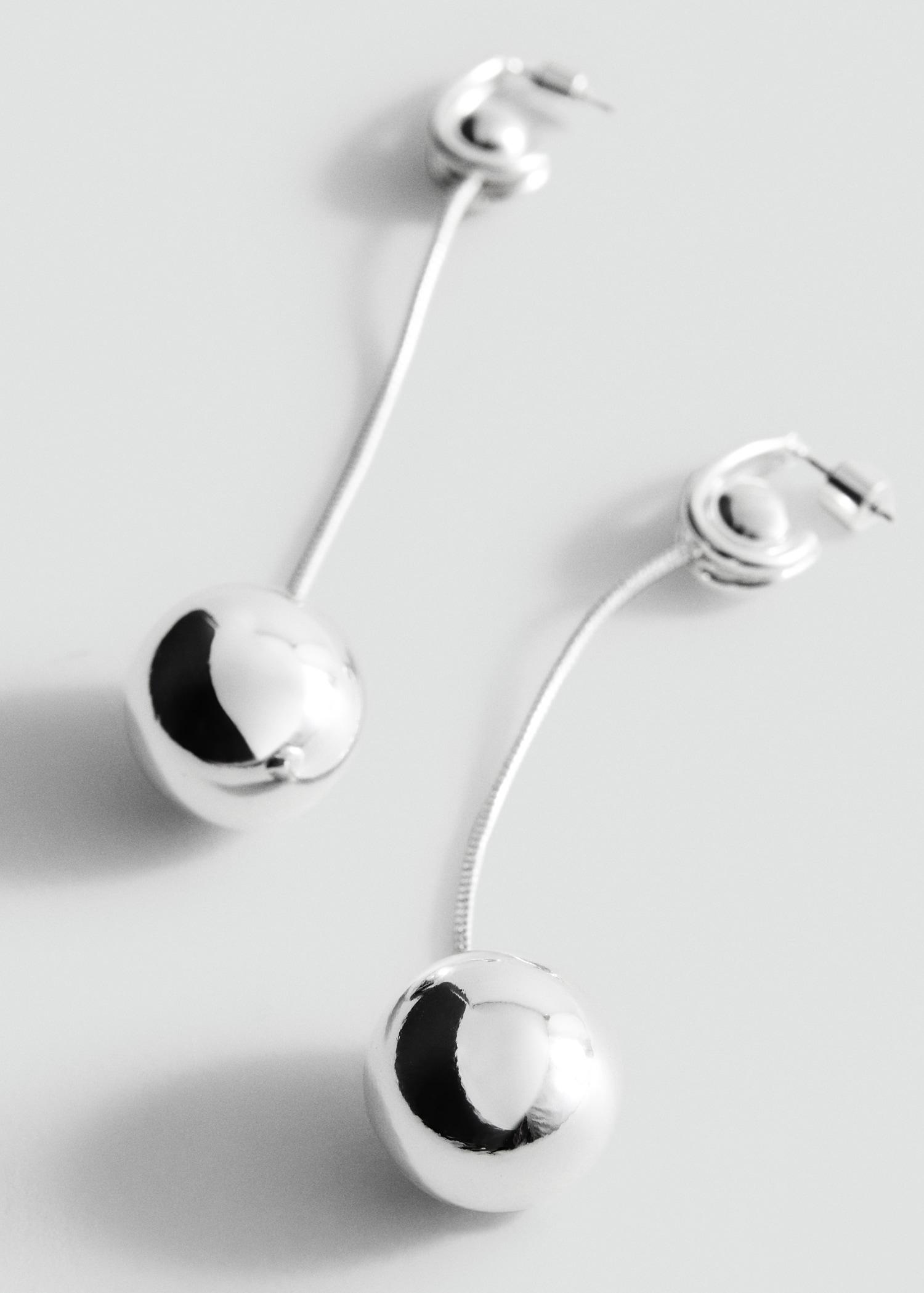 Thread sphere earrings - Women | MANGO USA Product Image