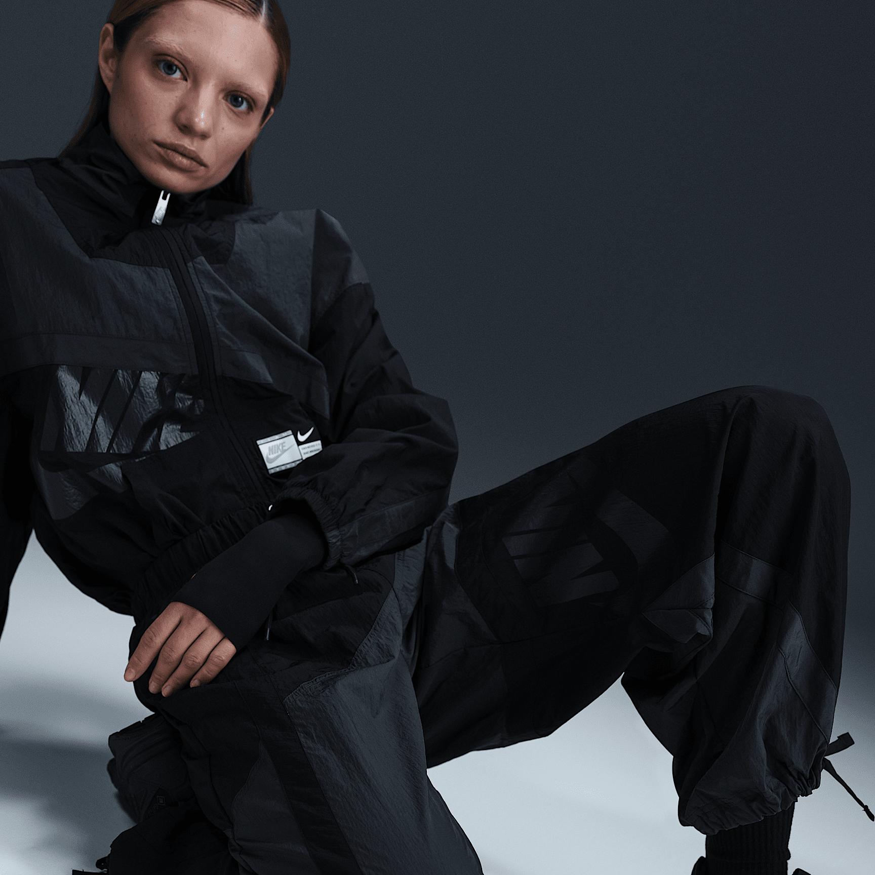 Nike Sportswear Women's Mid-Rise Loose Woven Open-Hem Pants Product Image