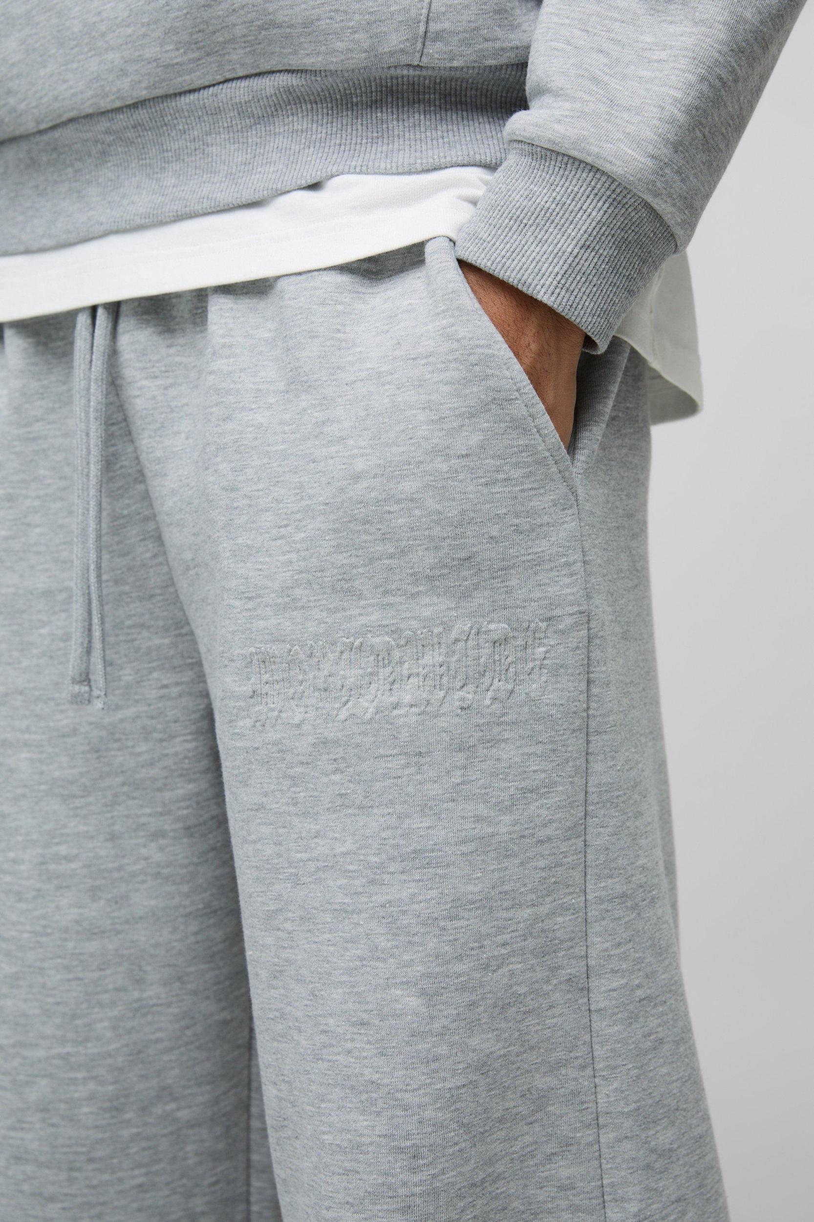 Wide Leg Worldwide Embossed Sweatpants | boohooMAN USA Product Image