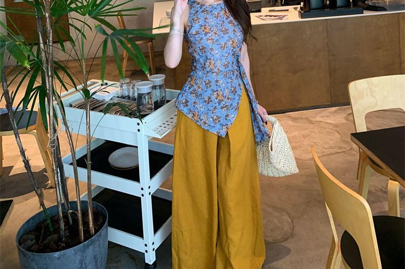 Sleeveless Round Neck Floral Print Top / High Rise Wide Leg Pants Product Image
