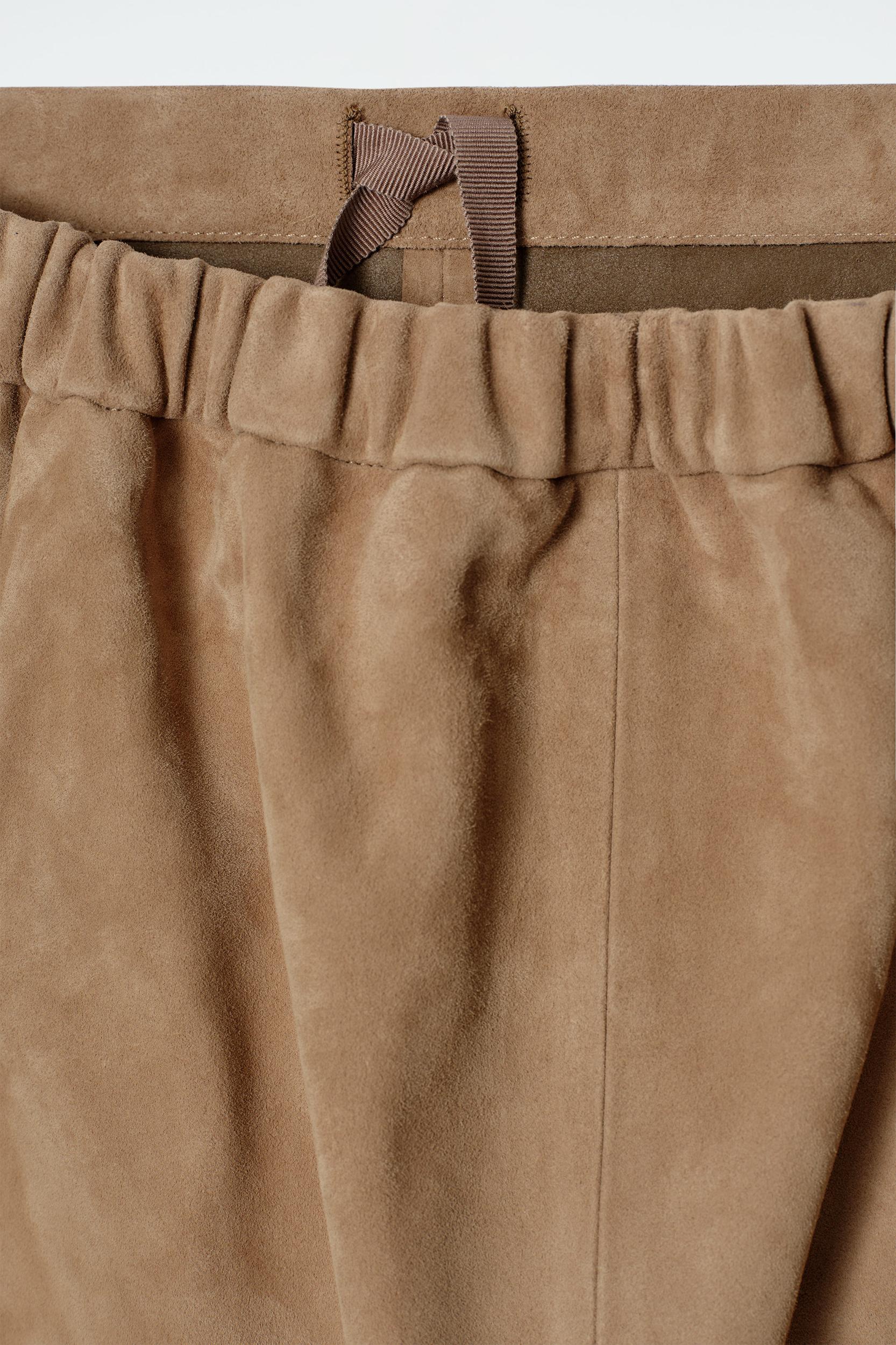 PANELED SUEDE DRAWSTRING MIDI SKIRT Product Image