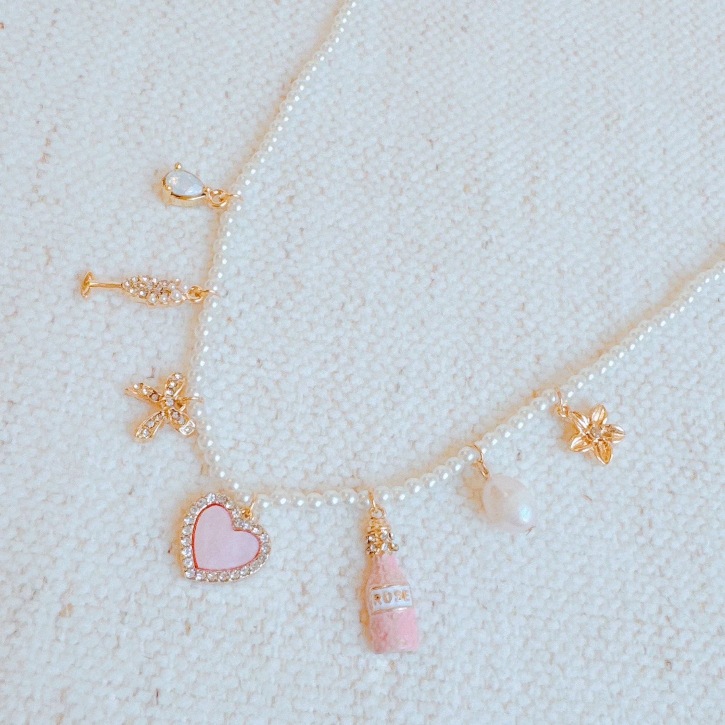 Pink Wink Celebration Multi Charm Necklace Product Image