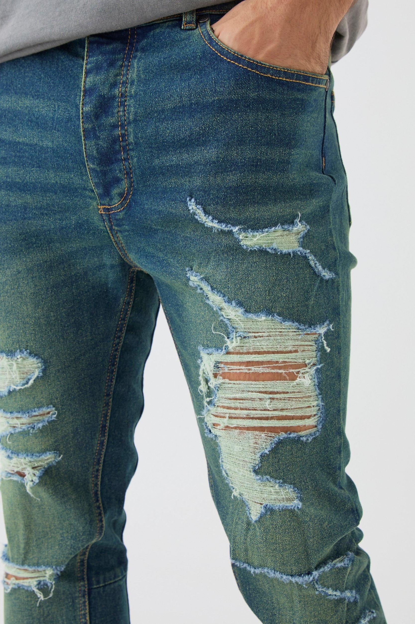 Skinny Stretch Stacked Flared Ripped Jeans | boohooMAN USA Product Image