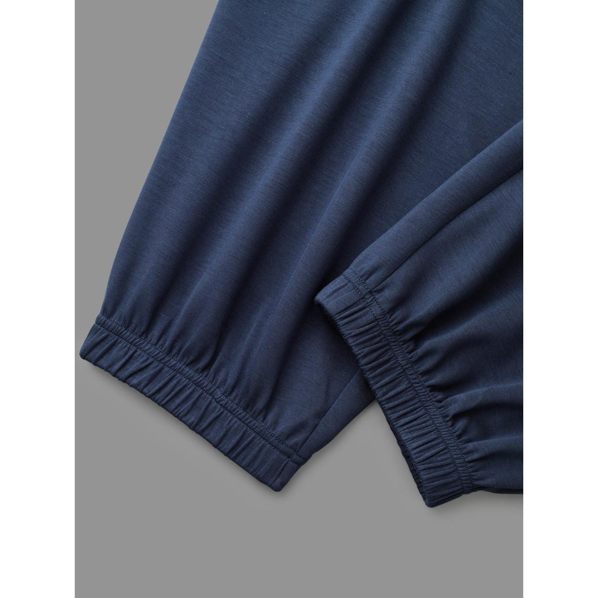 Plus Size Mid Rise Patched Pocket Carrot Pants Women Indigo Casual Loose Mid Rise Everyday Pants BloomChic 12/L Product Image