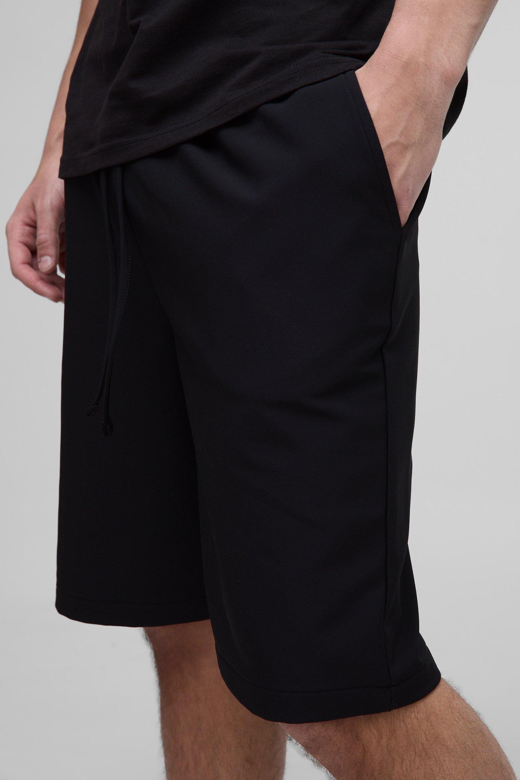 Elasticated Waist Relaxed Technical Stretch Shorts | boohooMAN USA Product Image