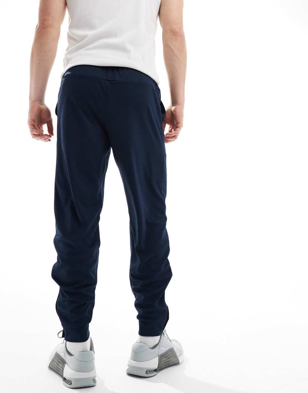 Nike Training Totality knit tapered sweatpants in navy Product Image
