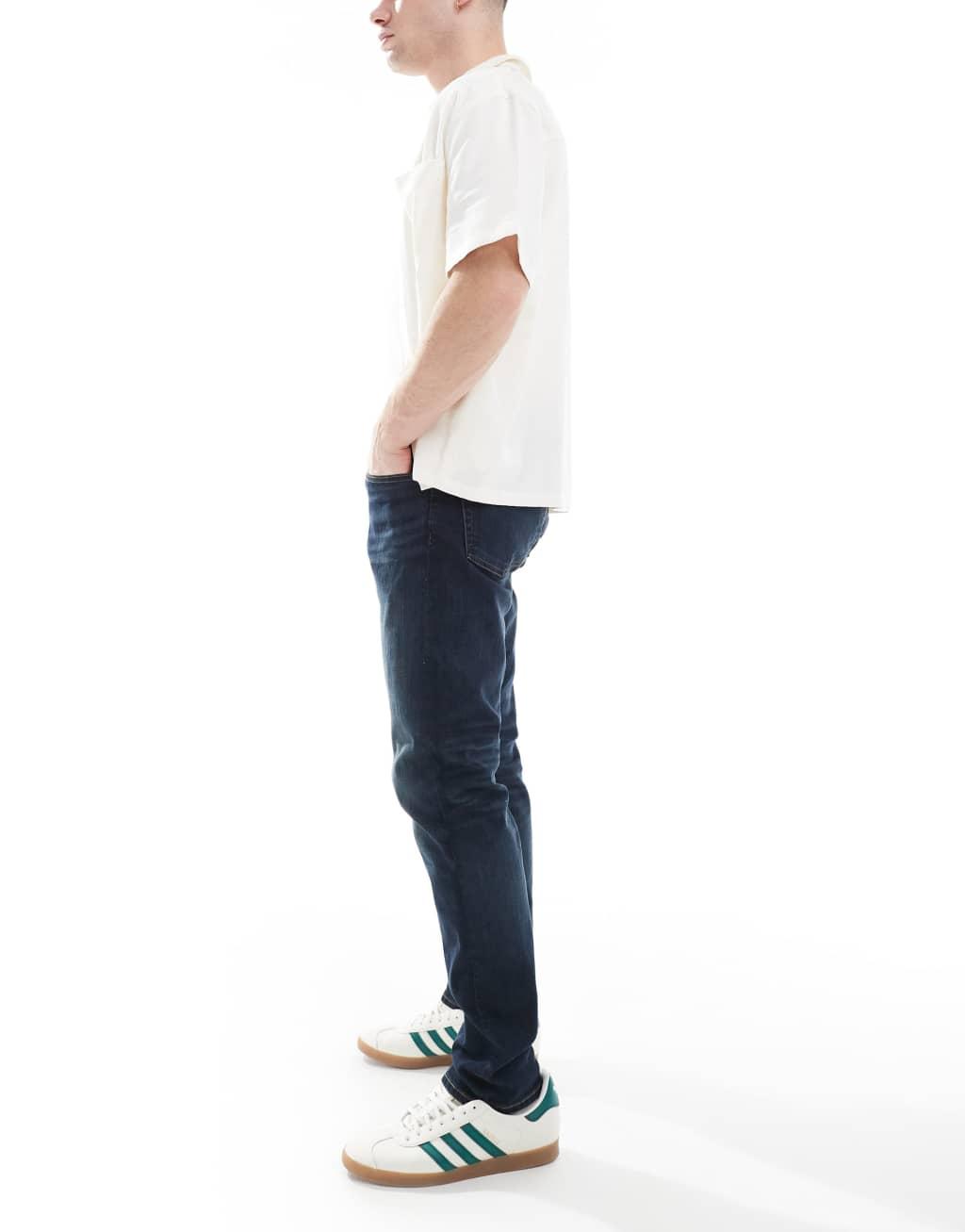 Polo Ralph Lauren Parkside icon logo back pocket low straight fit jeans in dark wash Product Image