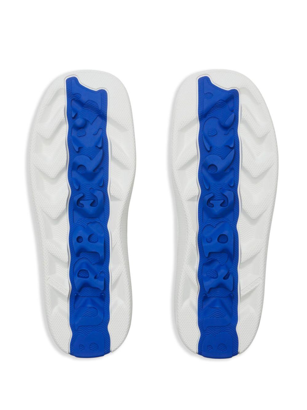 Box logo-debossed leather sneakers Product Image