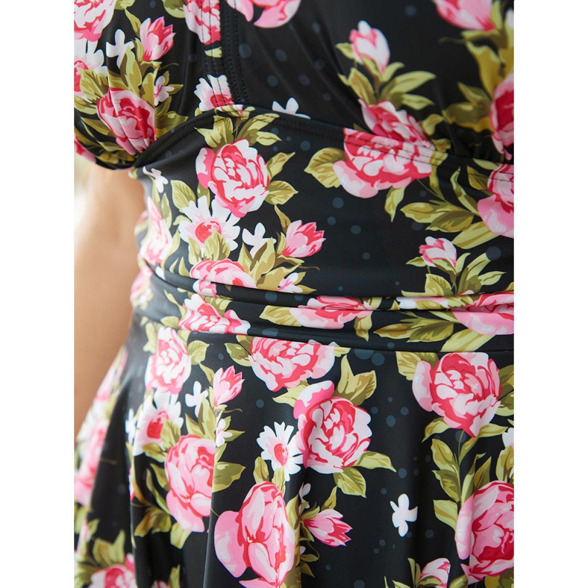 Plus Size Floral Print V Neck Empire Waist Ruffle Hem Swim Dress Women's Swimwear BlackFlower Vacation Bodycon V-neck High stretch Curve Swim Dresses BloomChic 10/M Product Image