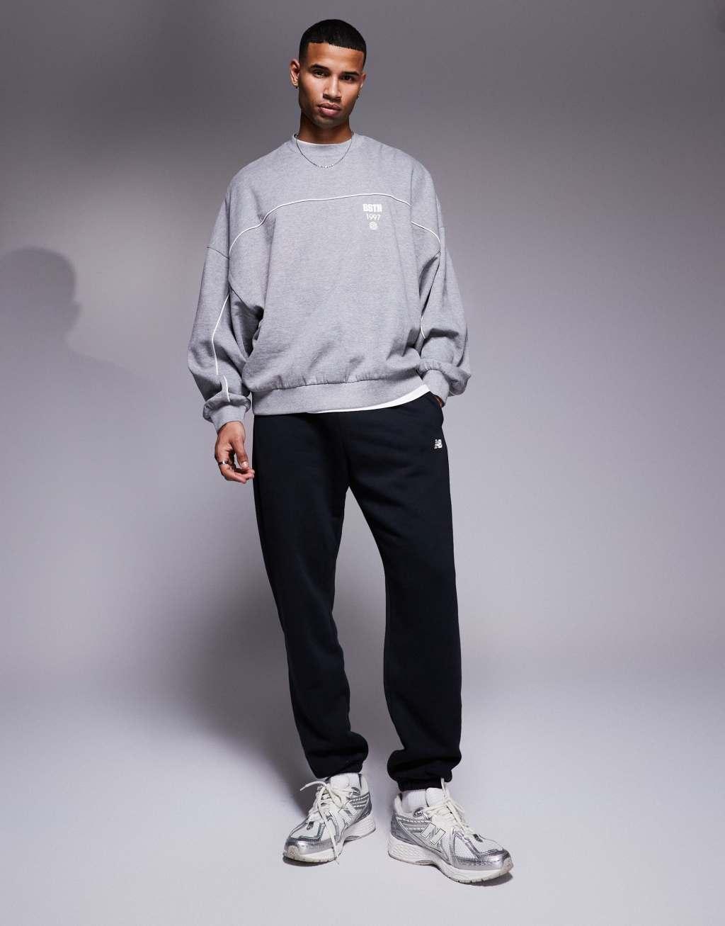 New Balance Sport Essentials Fleece track pants in black Product Image