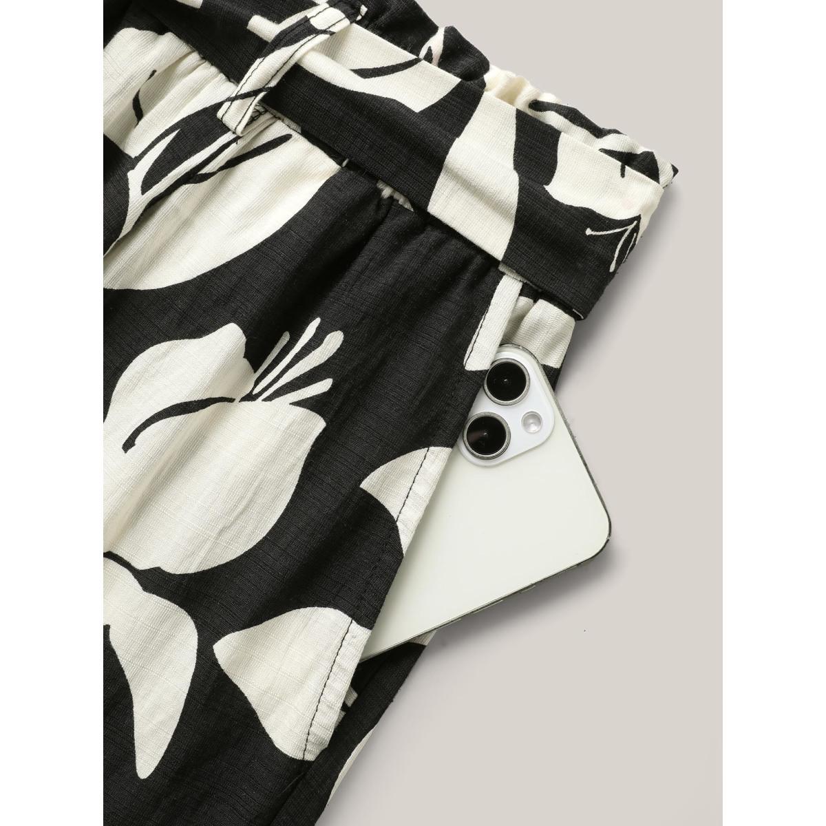 Plus Size Leafy Ruffled Hem Belted Wide-Leg Pants Women BlackFlower Resort Wide Leg Mid Rise Vacation Pants BloomChic 12/L Product Image