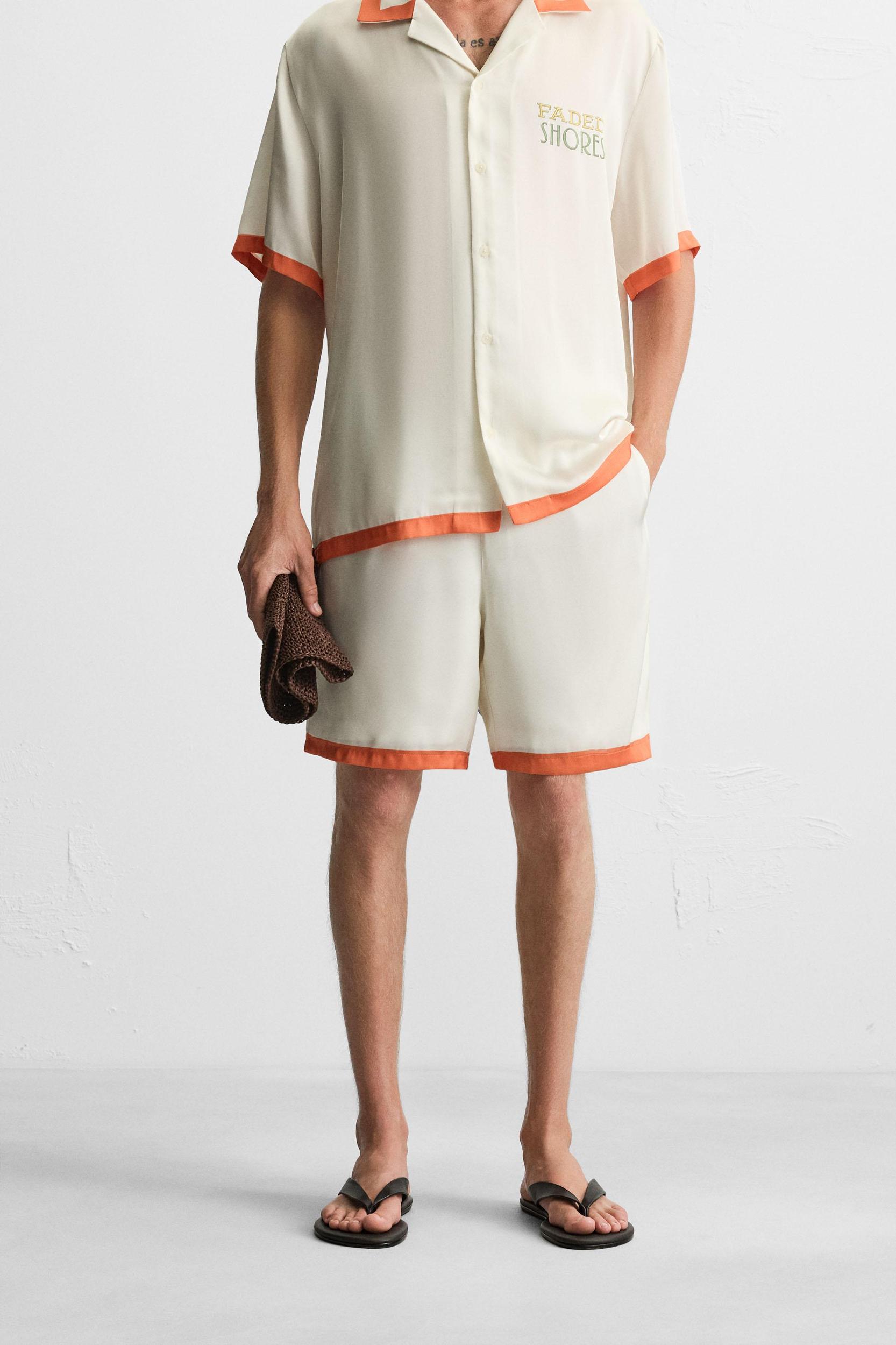 SATIN SHORTS WITH CONTRAST STRIPES Product Image