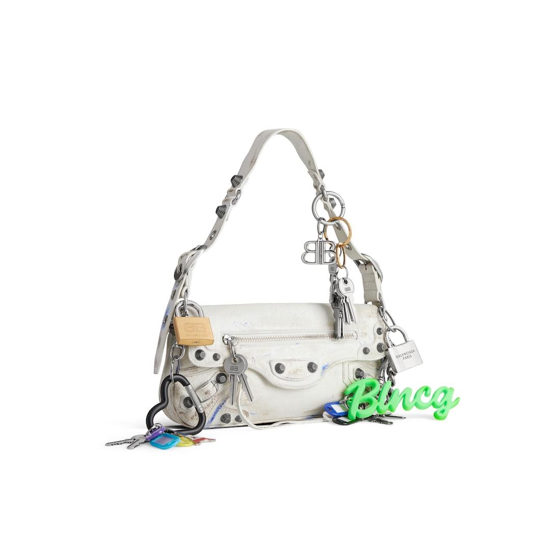 Women's Le Cagole Sling Bag Small With Charms in White Product Image