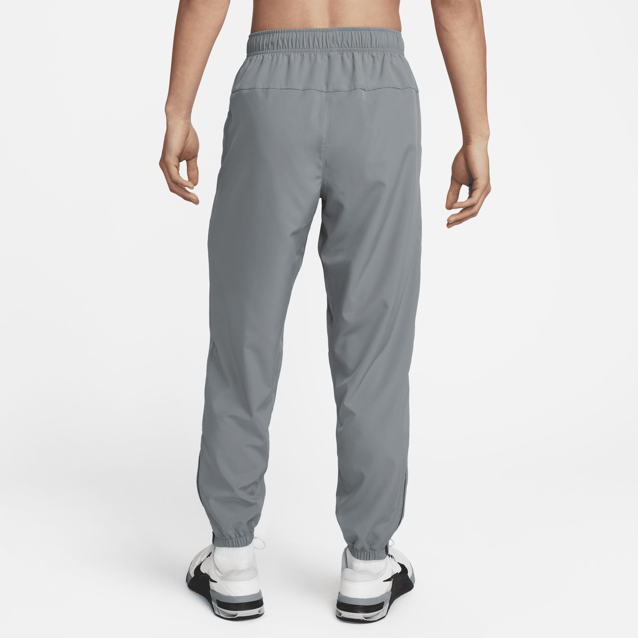 Nike Mens Form Dri-FIT Tapered Versatile Pants | FB7497-084 Product Image