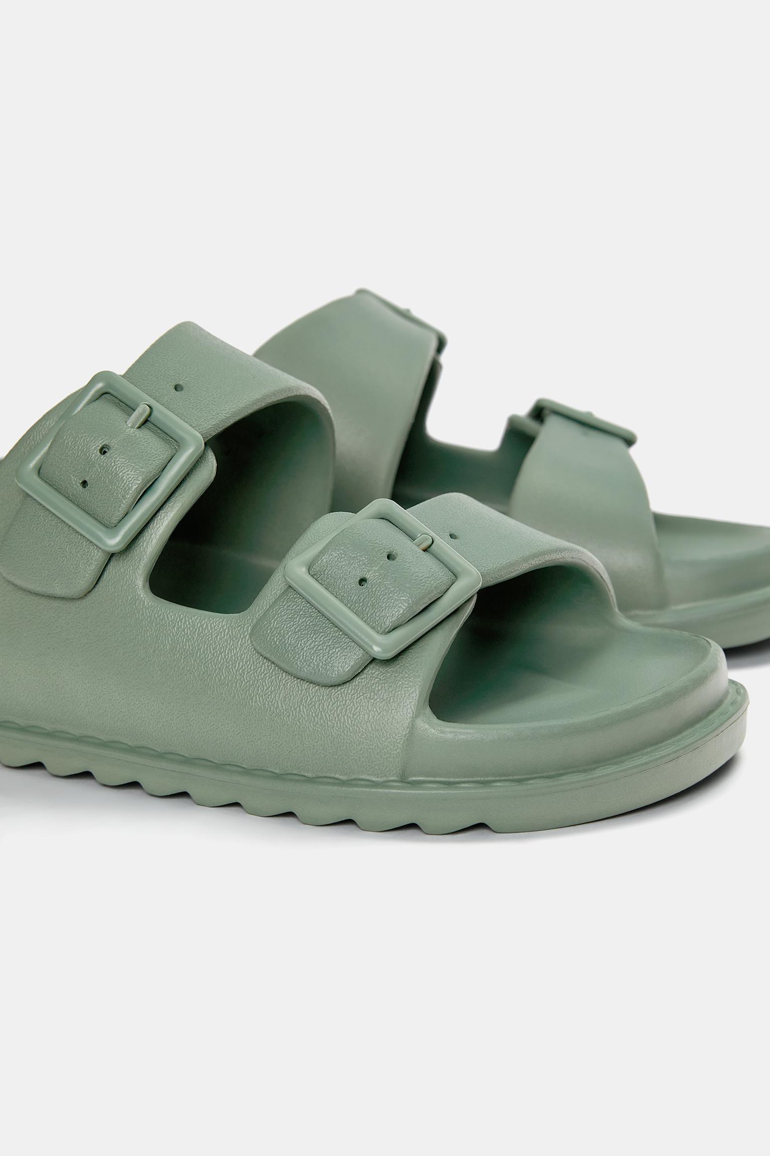 Rubberized buckle sandals Product Image