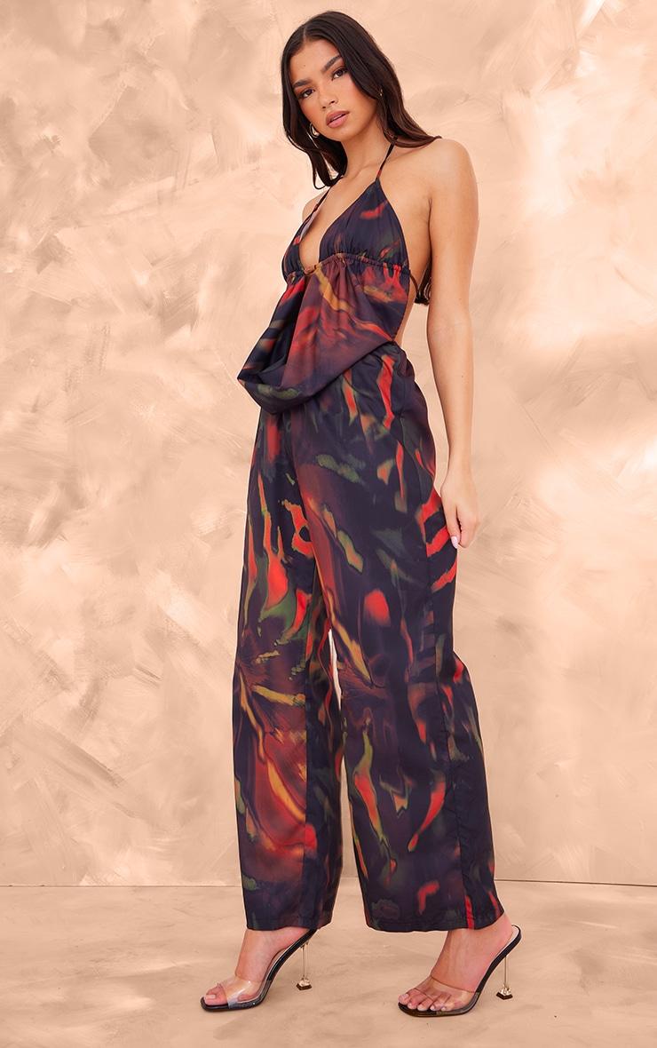 Black Leaf Printed Cowel Detail Halter Neck Jumpsuit Product Image