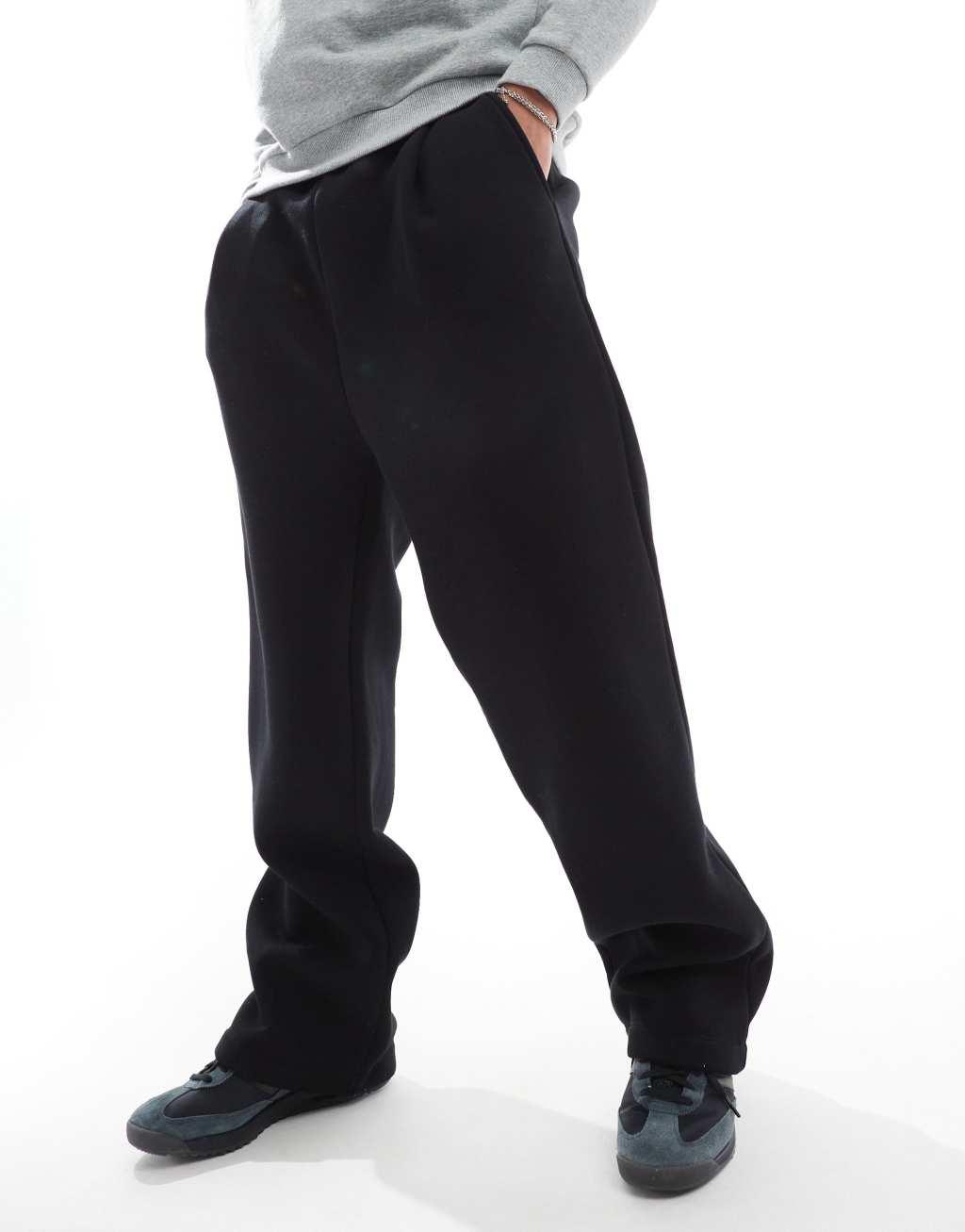 ASOS DESIGN oversized balloon sweatpants with pleat in black Product Image