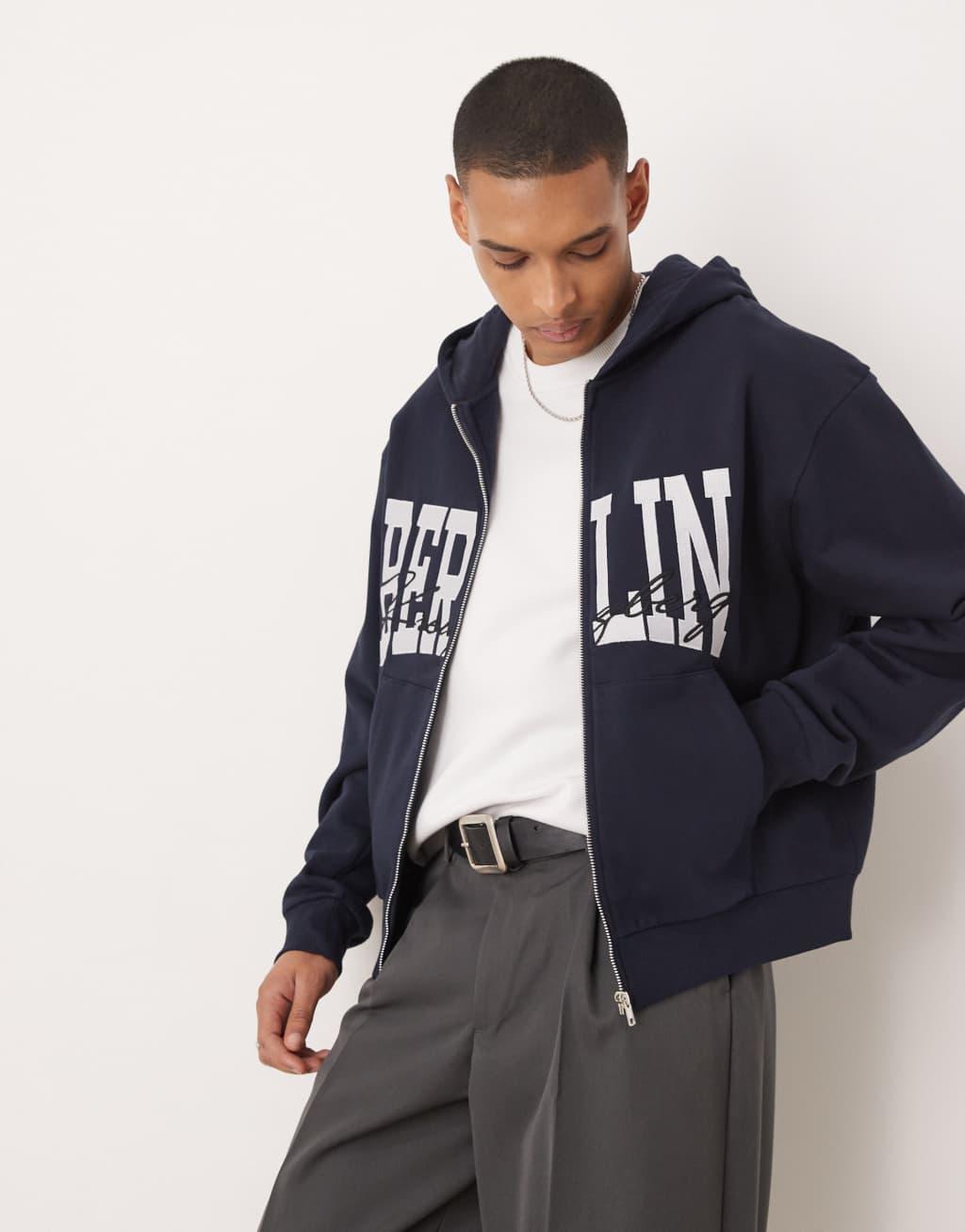 ASOS DESIGN oversized boxy zip through hoodie with berlin print in navy Product Image