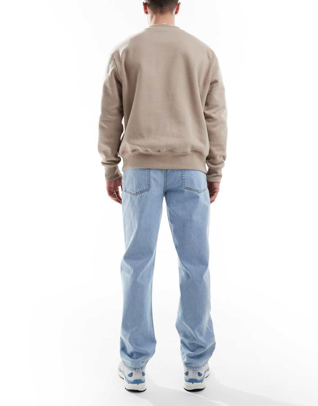 ASOS DESIGN straight leg jeans in light wash blue Product Image