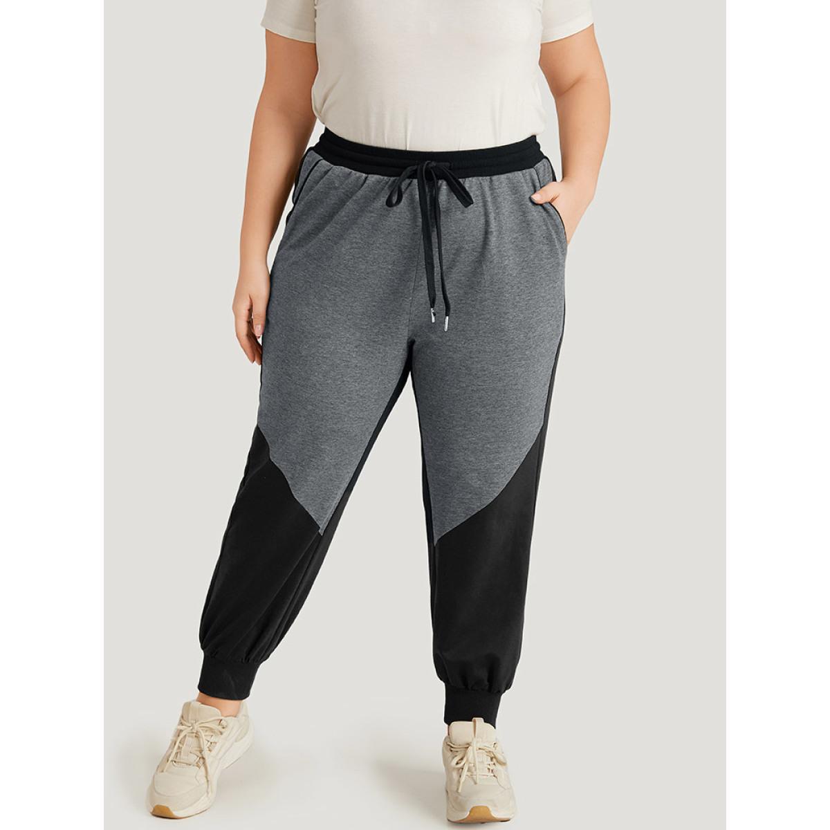 Contrast Patchwork Pocket Drawstring Elastic Waist Sweatpants Black Plus Size Women Casual Dailywear Contrast 28/5X Bloomchic Product Image