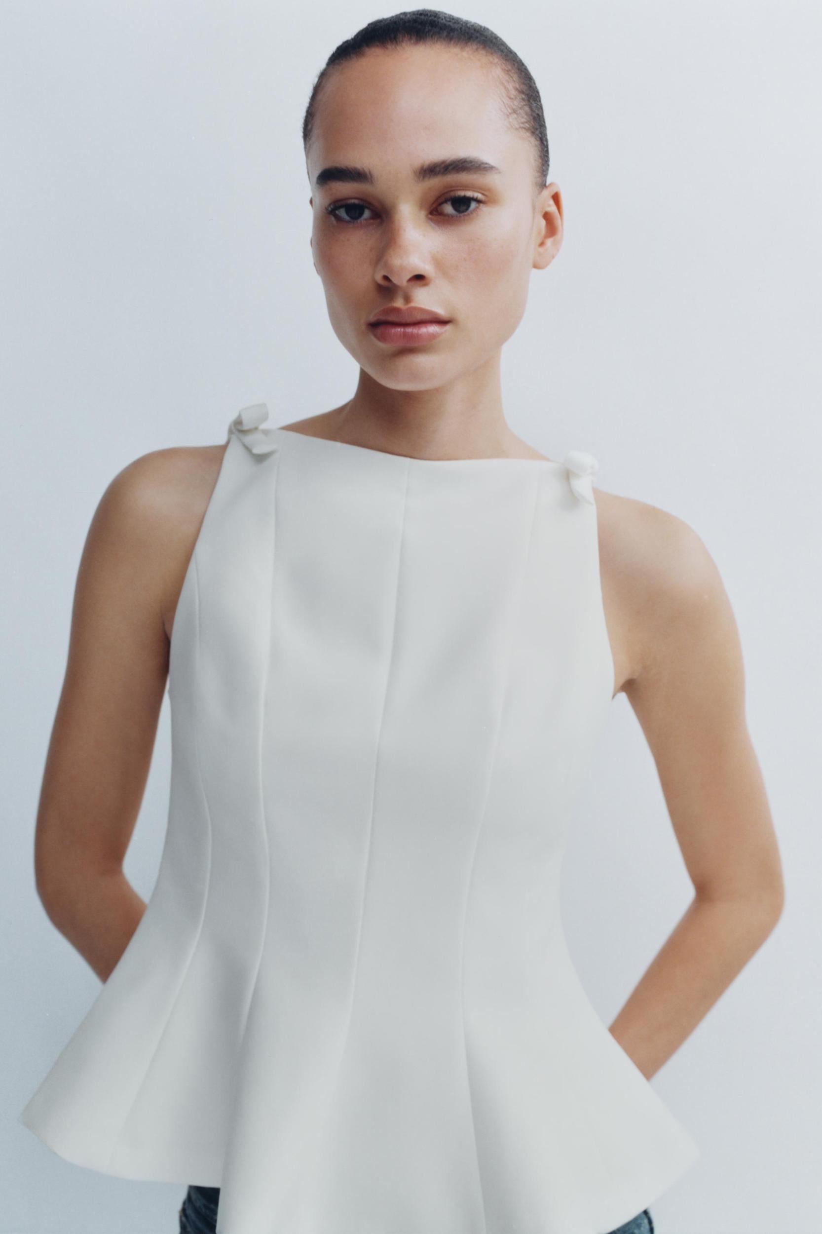 PEPLUM BOWS TOP Product Image