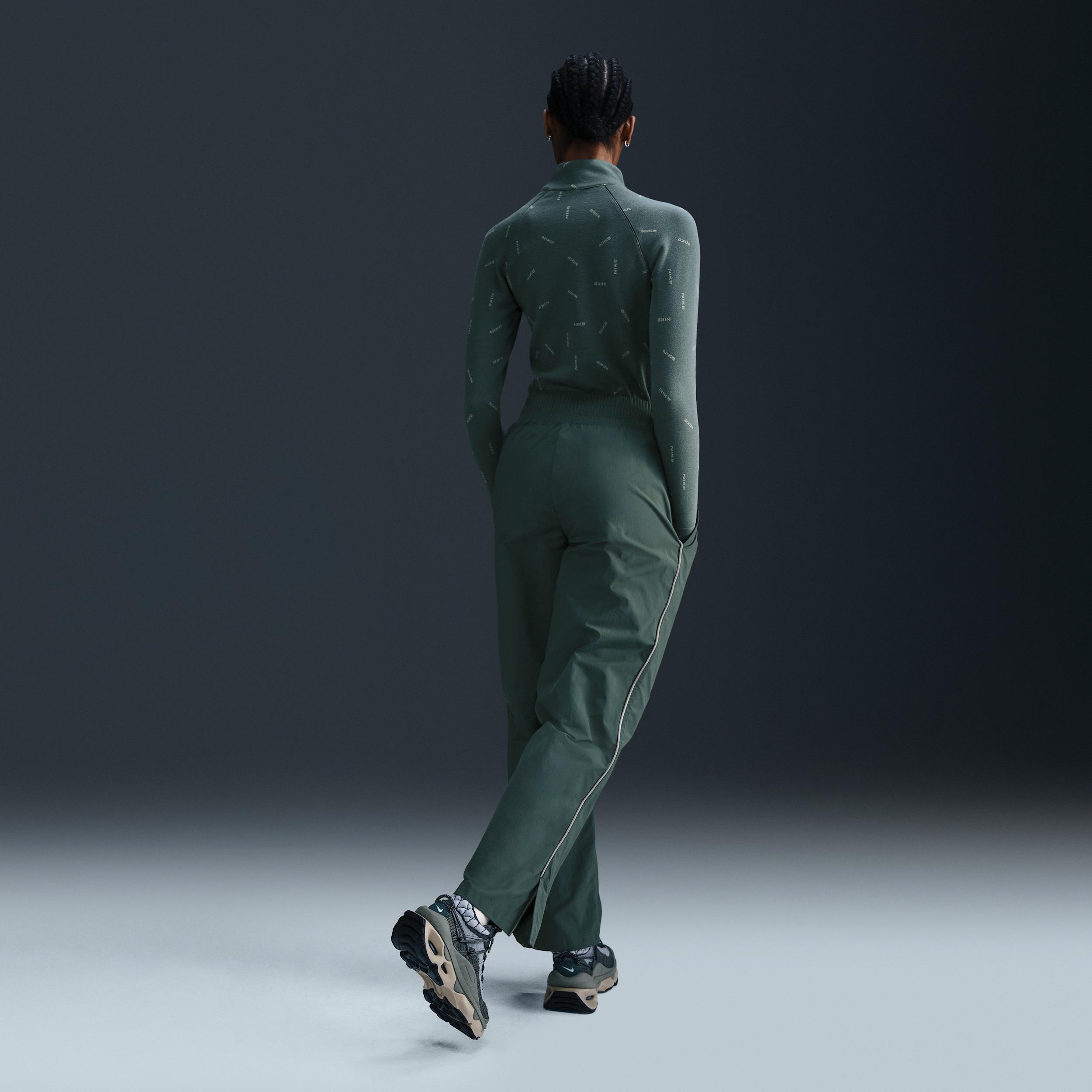 Nike Sportswear Collection Women's Mid-Rise Repel Asymmetrical-Waist Trousers Product Image