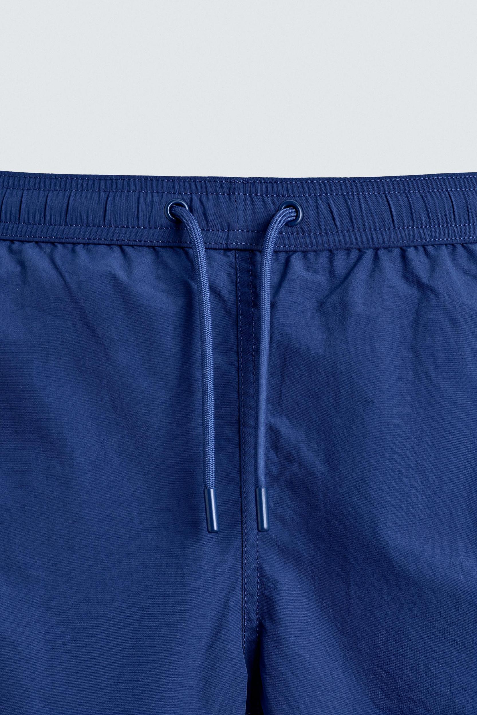 CONTRAST SHORT SWIMSUIT Product Image