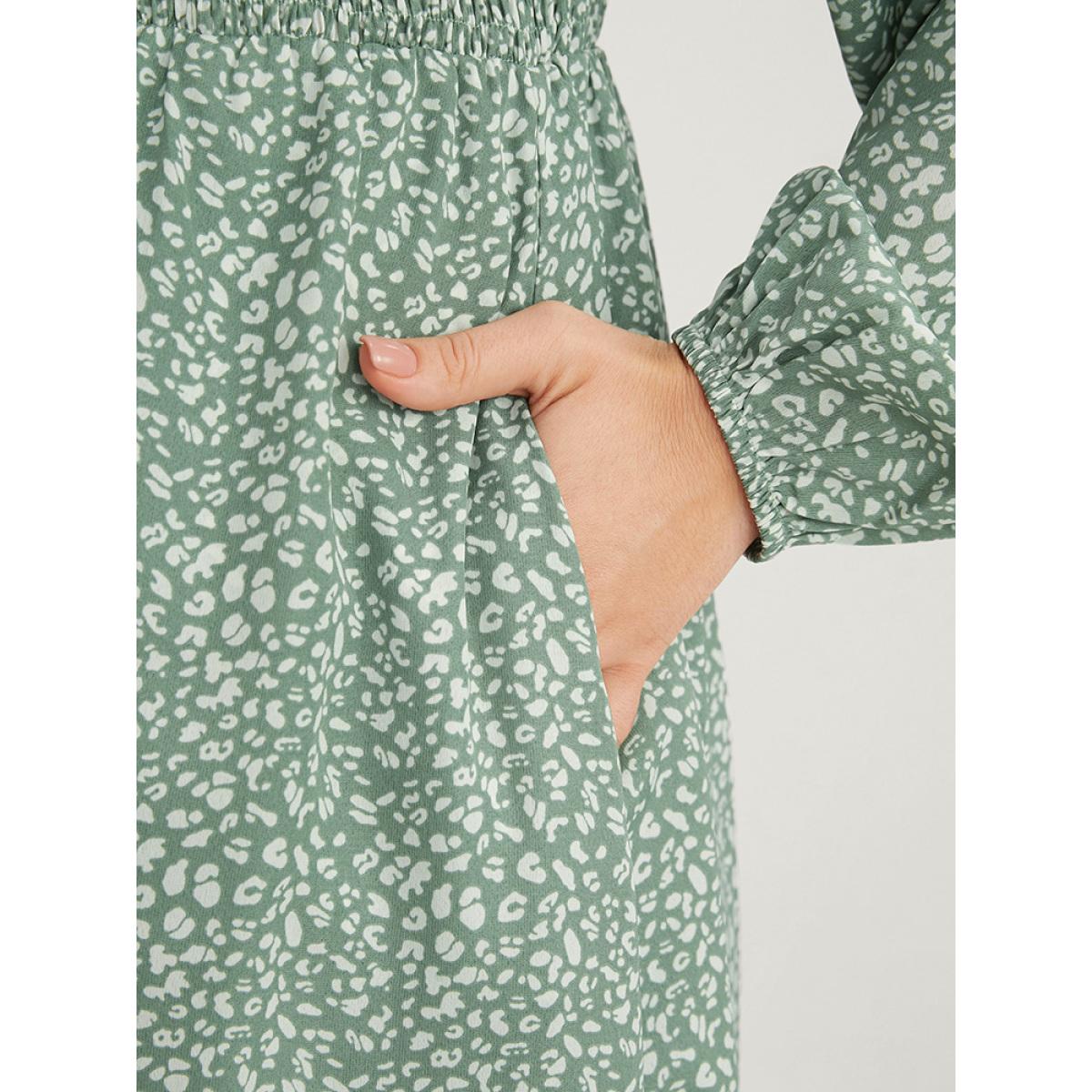 Plus Size Leopard Print Lantern Sleeve Shirred Pocket Flutter Knee Dress Green Women Elegant Elastic Waist Round Neck Long Sleeve Curvy Knee Dress BloomChic 26/4X Product Image