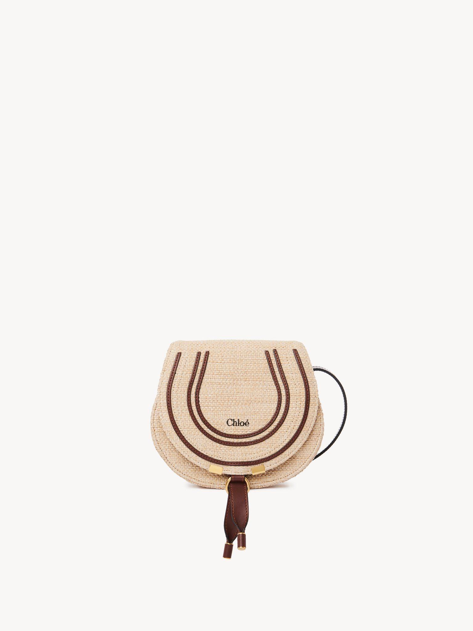 Small Marcie saddle bag in raffia-effect fibers  Product Image