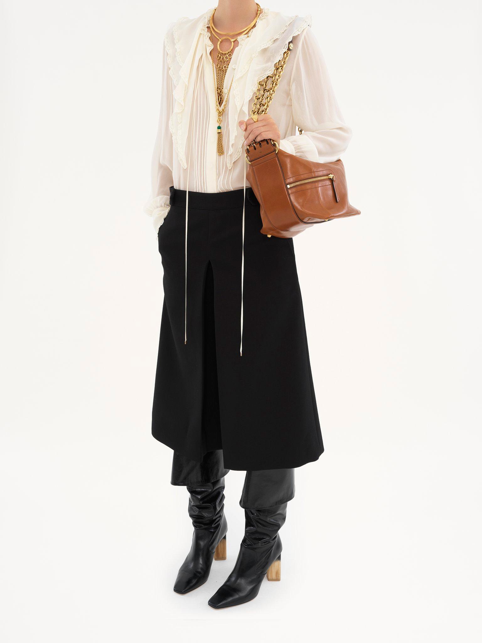 Camera Chain bag in shiny leather Product Image