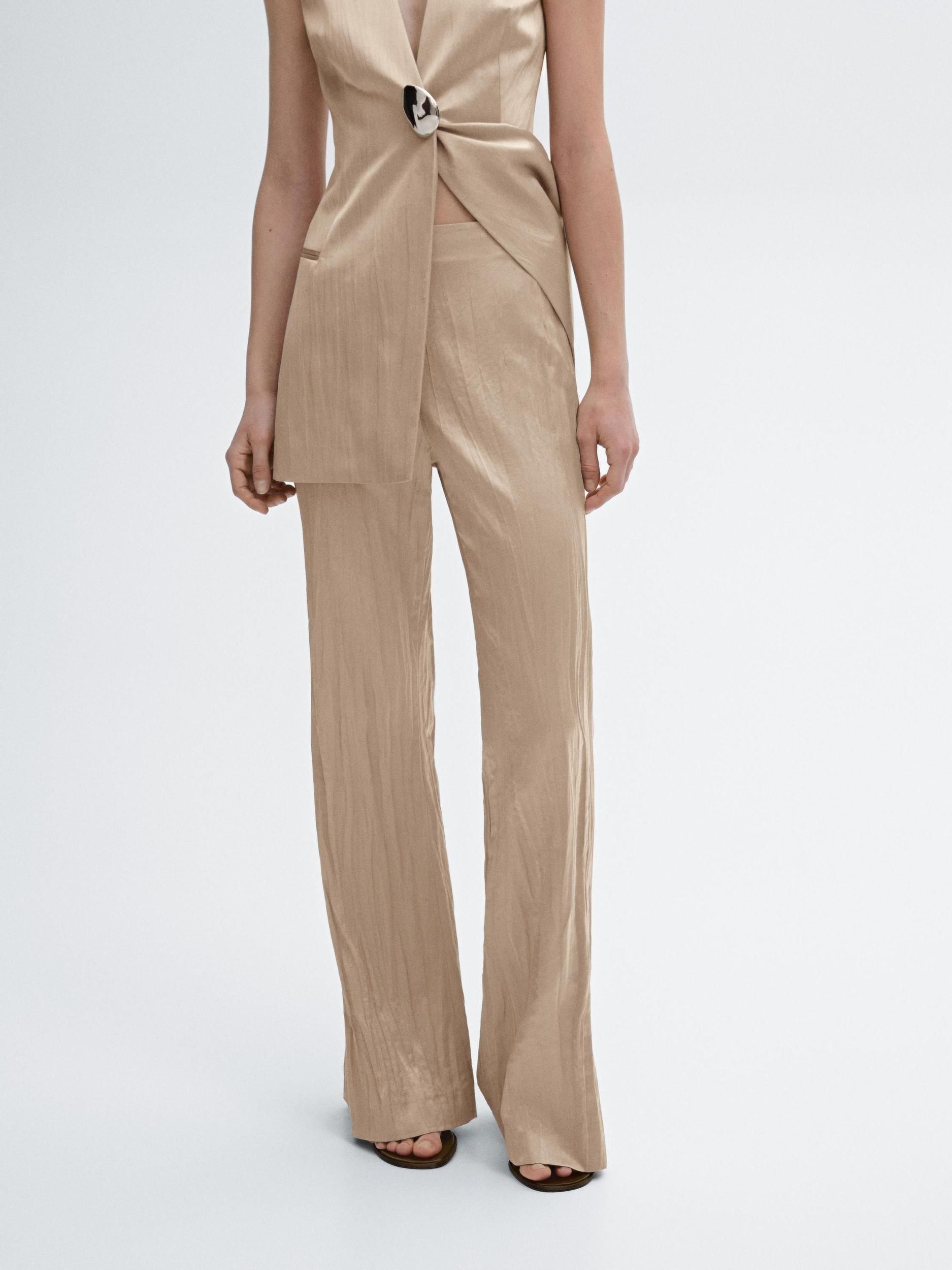 Flowing flared trousers Product Image