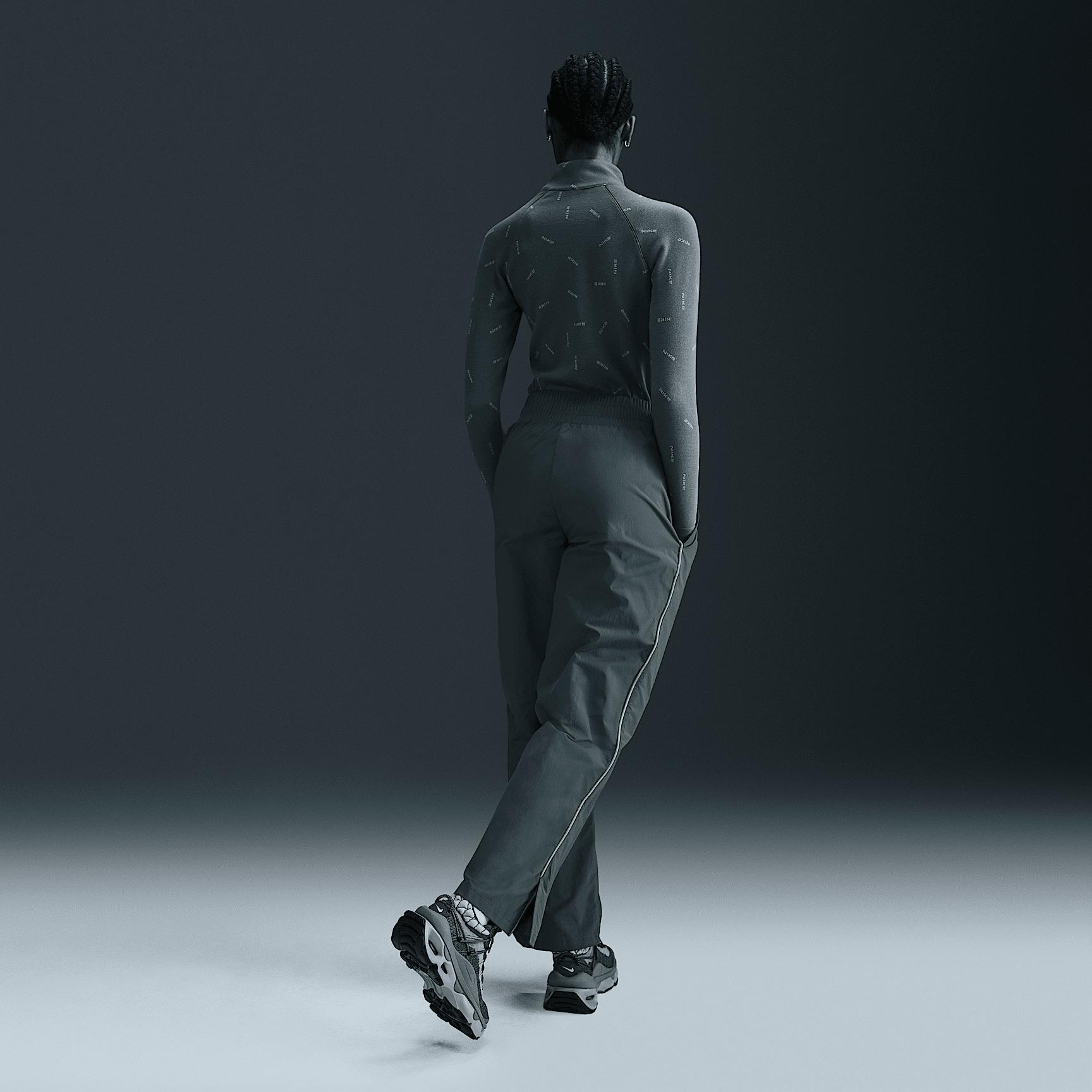 Nike Sportswear Collection Women's Mid-Rise Repel Asymmetrical-Waist Trousers Product Image