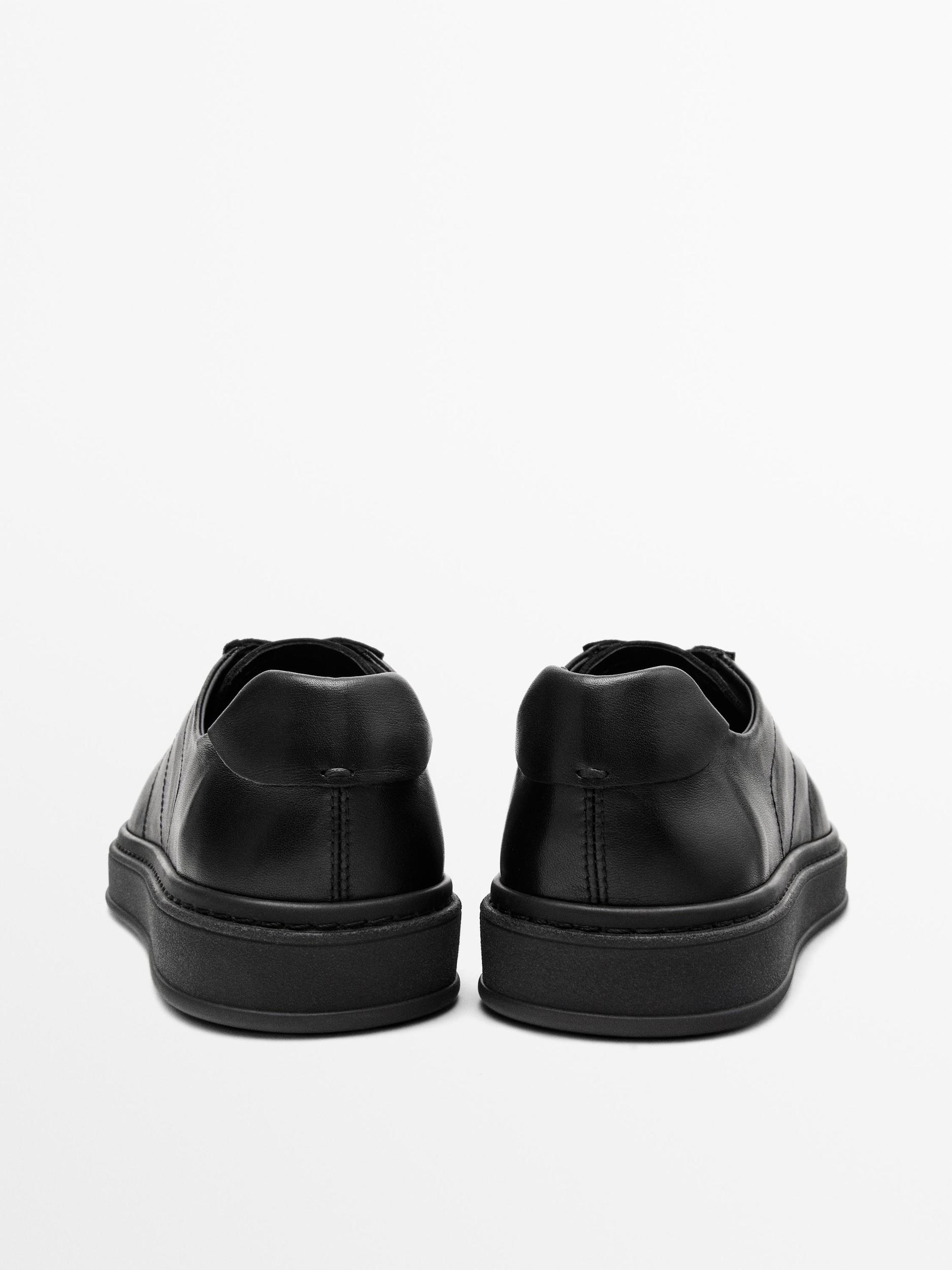 Contrast leather trainers Product Image