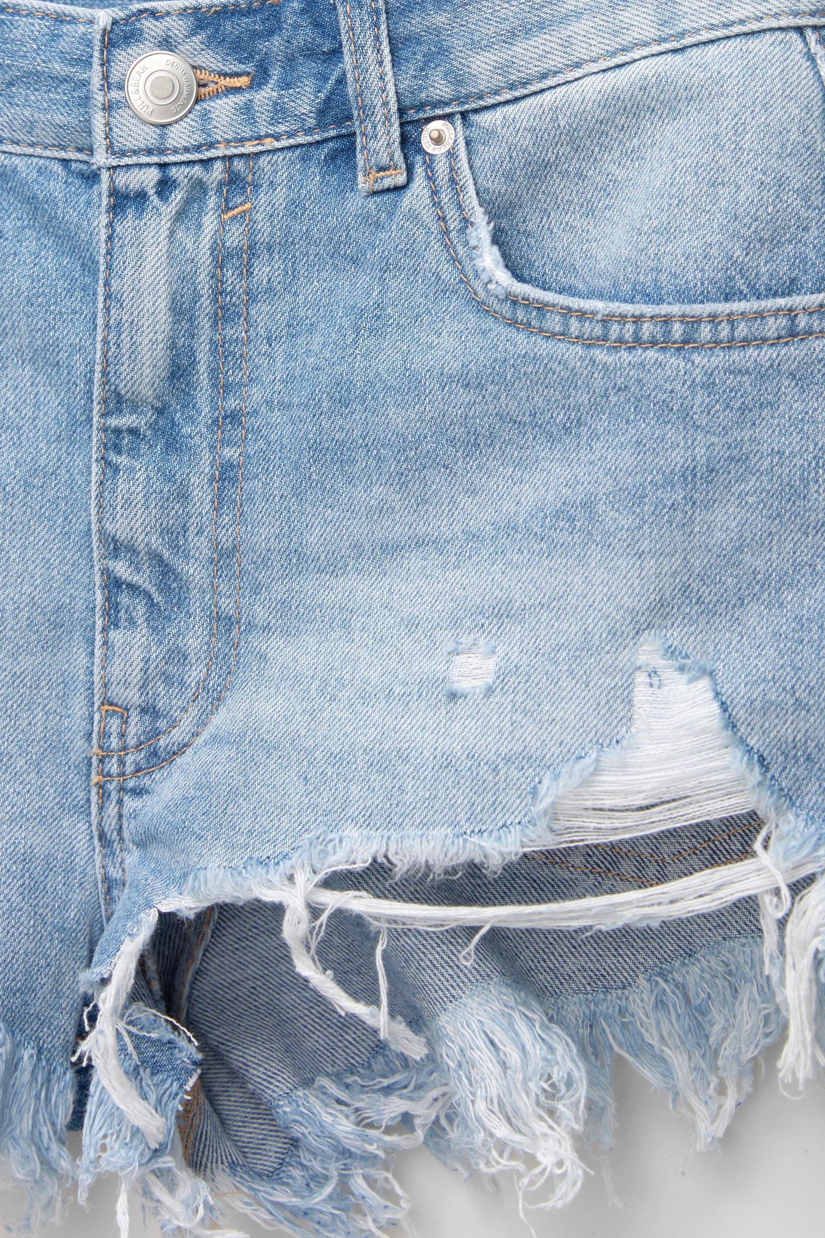 Ripped hem denim shorts Product Image