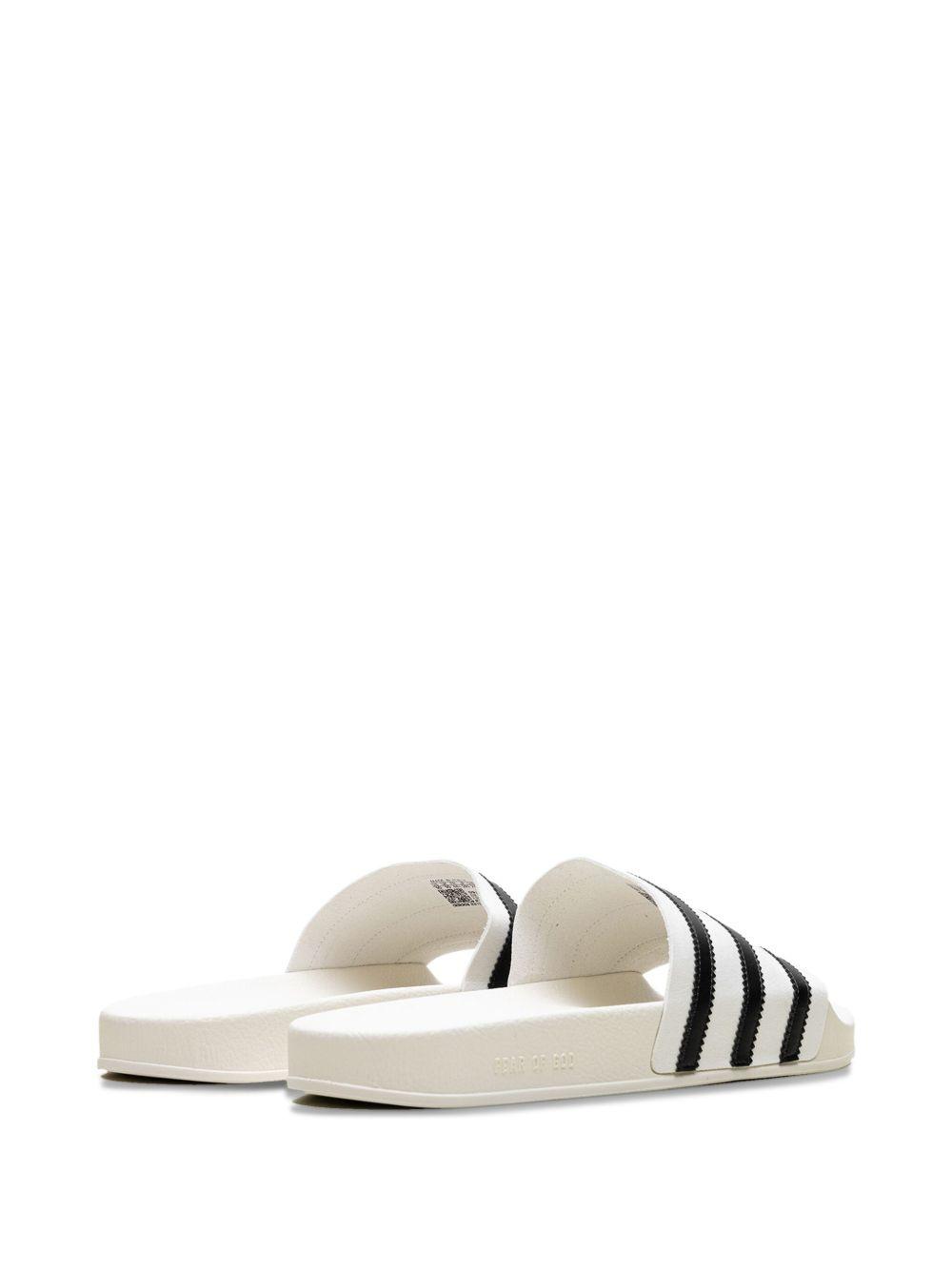 x Fear of God Athletics Adilette "Cream White" slides Product Image