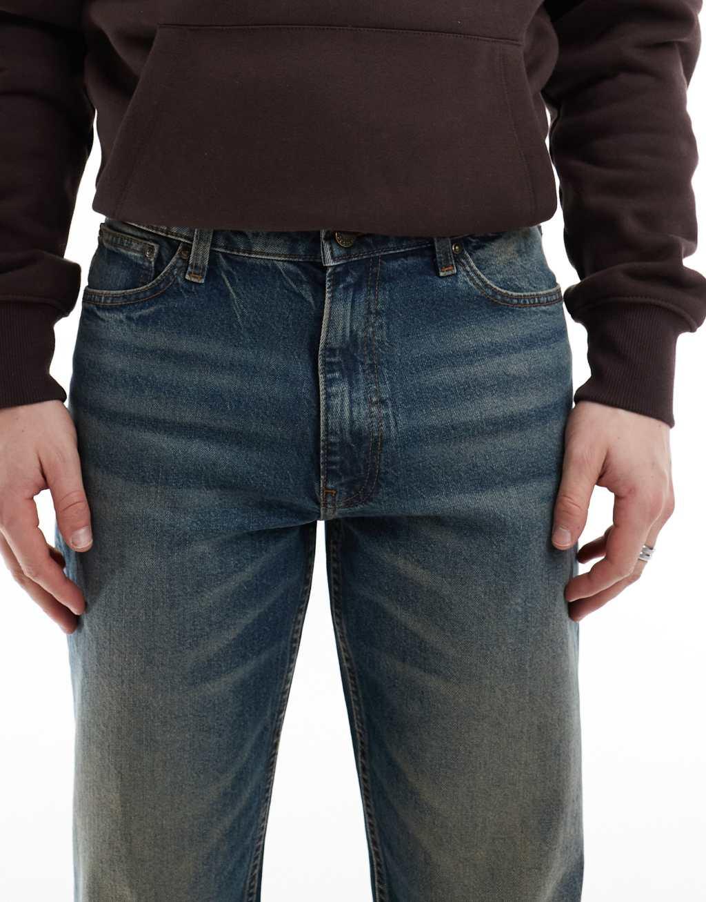 ASOS DESIGN straight leg stretch jeans with tint in dark wash blue Product Image