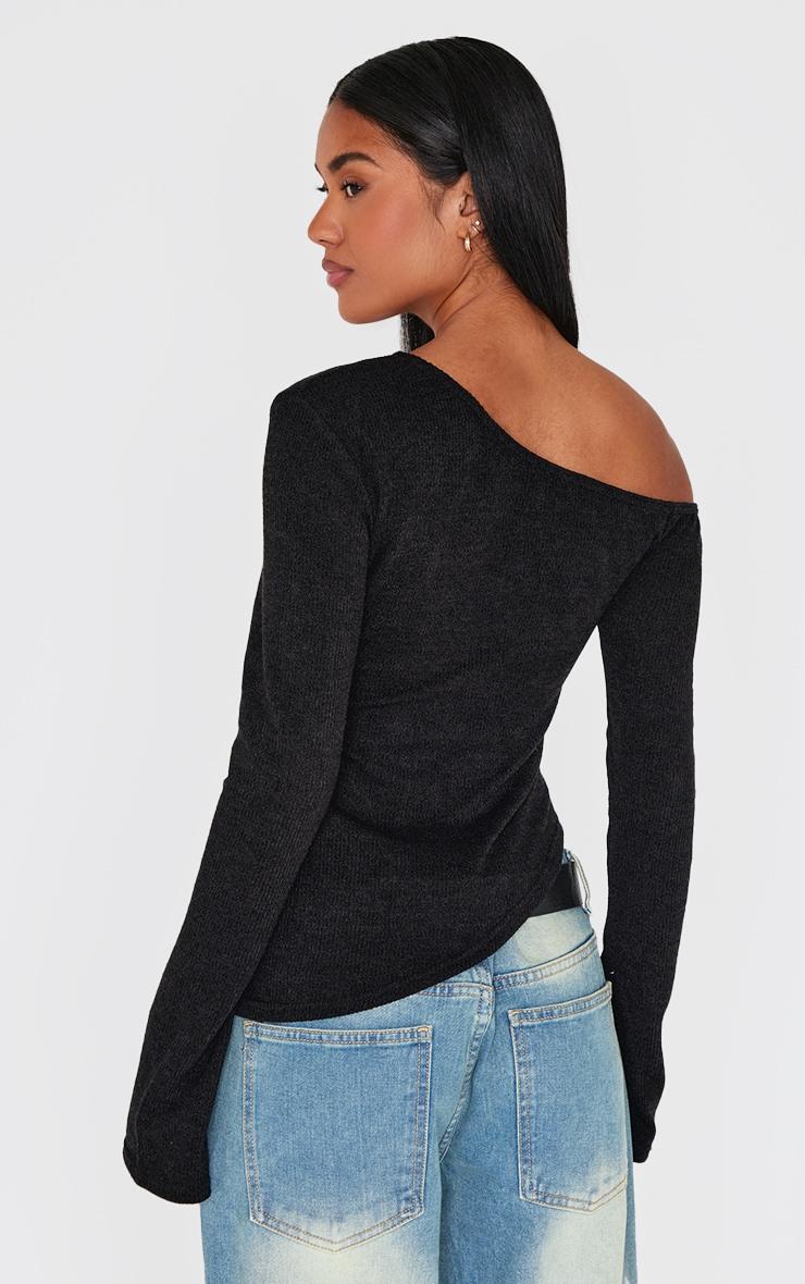 Black Textured Asymmetric Flared Sleeve Long Top Product Image