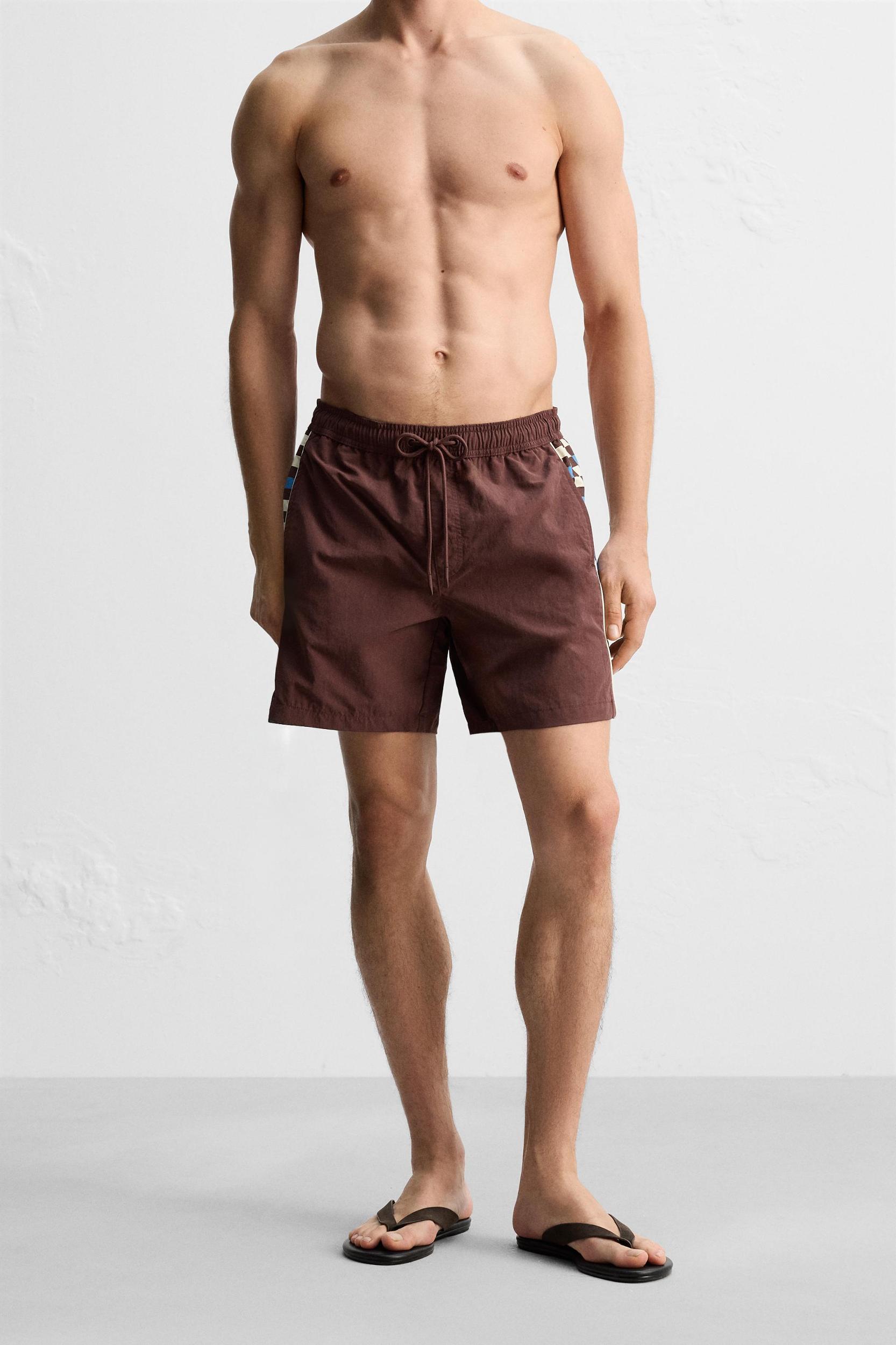 LONG SWIMSUIT WITH CONTRAST STRIPE Product Image