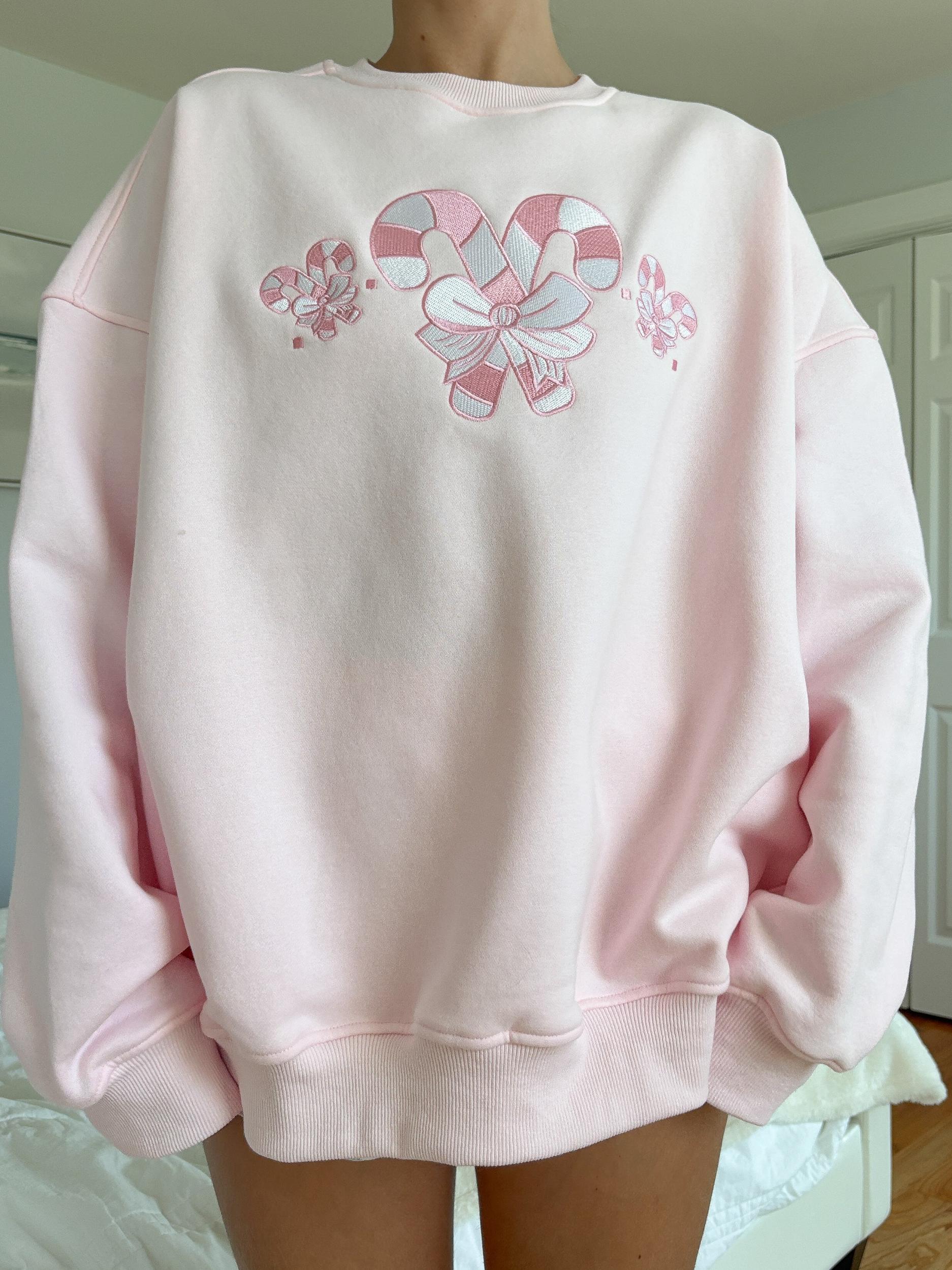 Light Pink Candy Cane Wonderland Sweatshirt Product Image