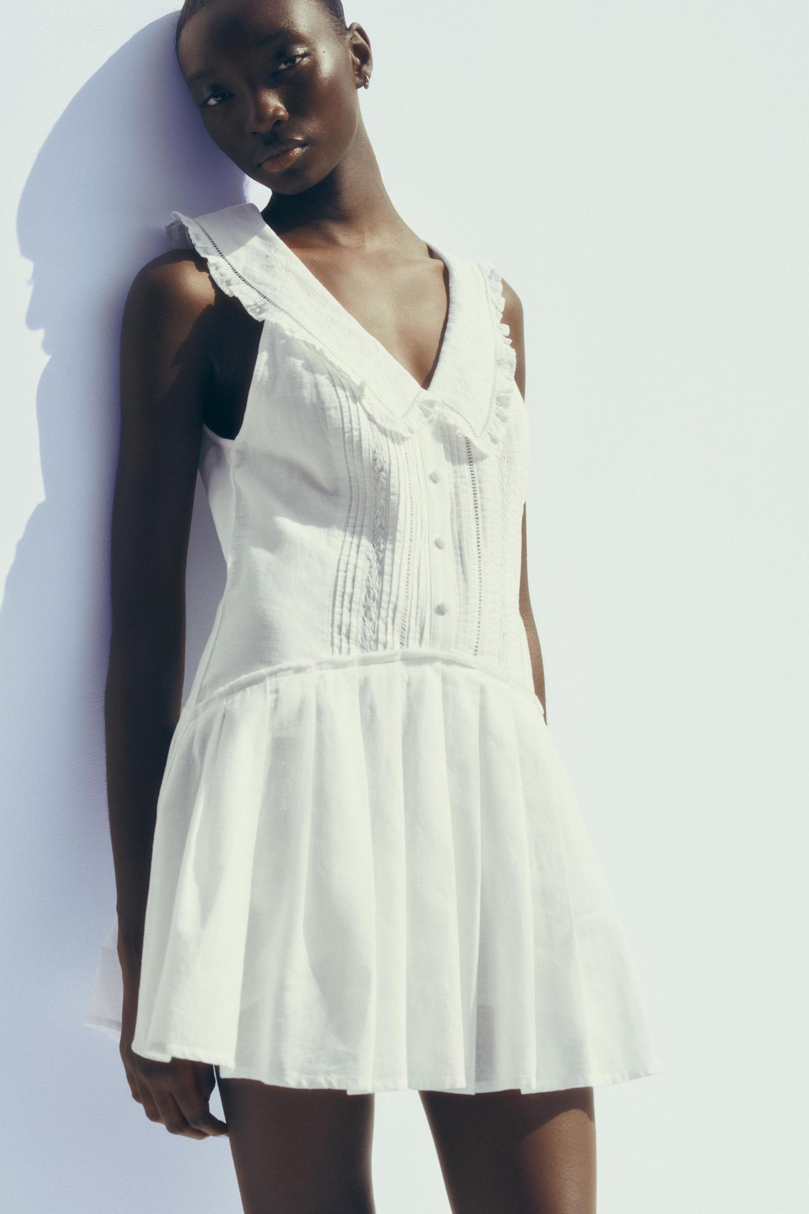 PLEATED PETER PAN COLLAR SHORT DRESS Product Image