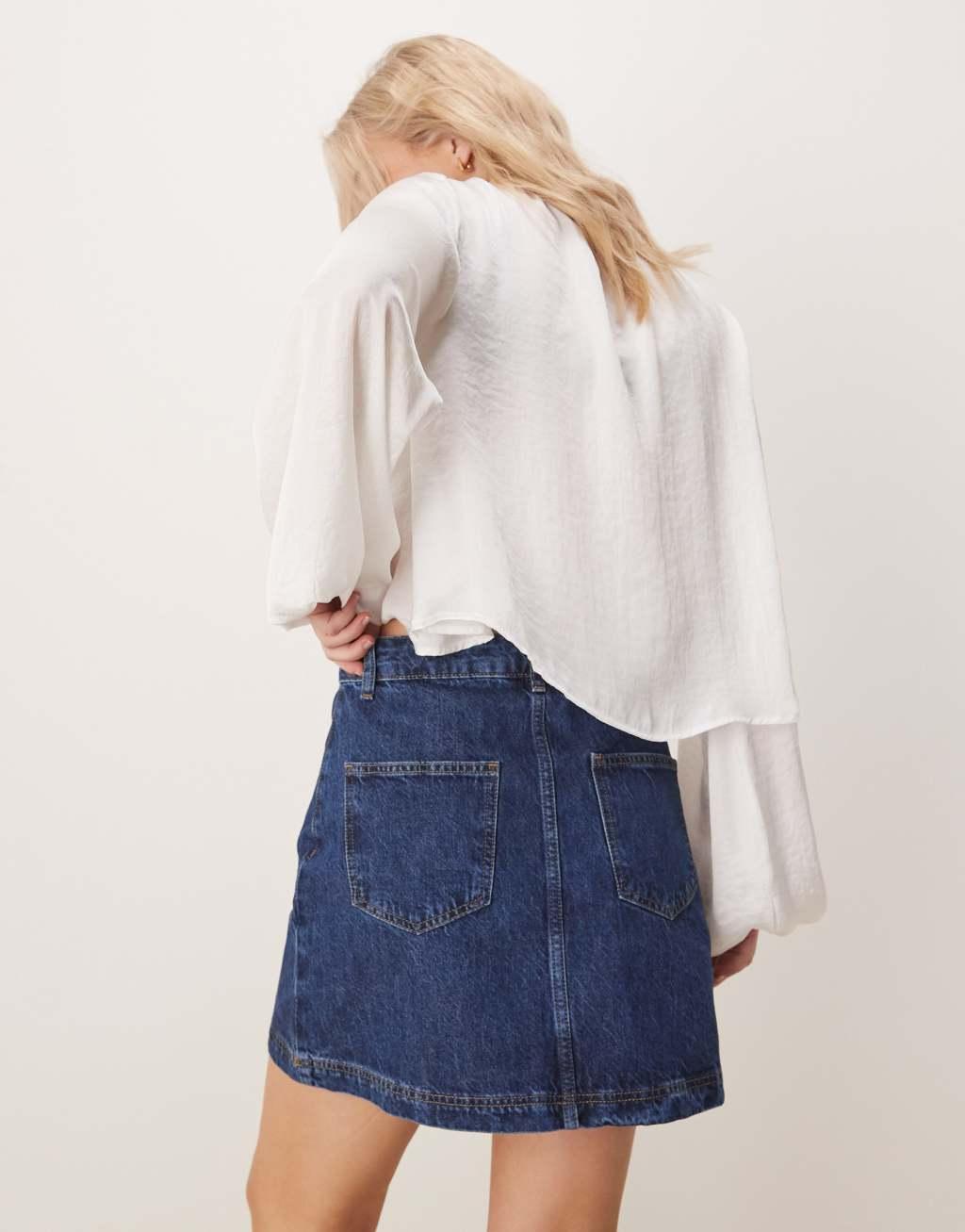 ASOS DESIGN denim patch pocket mini skirt in indigo Product Image
