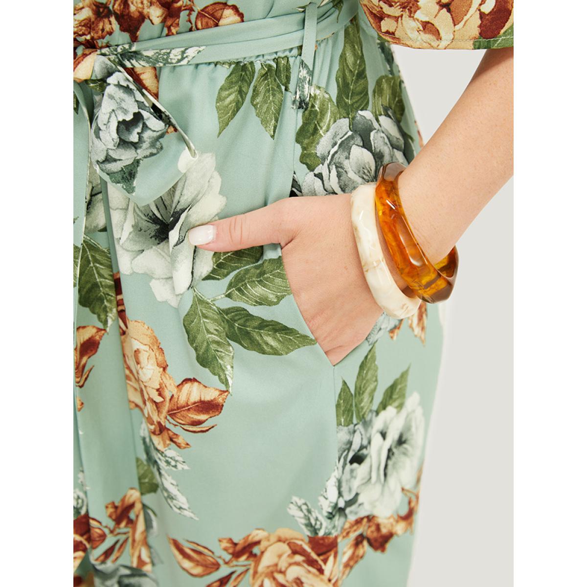 Plus Size Sage Floral Flutter Sleeve Gathered Belt Pocket Jumpsuit Women Elegant Short sleeve Round Neck Dailywear Loose Jumpsuits BloomChic 12/L Product Image