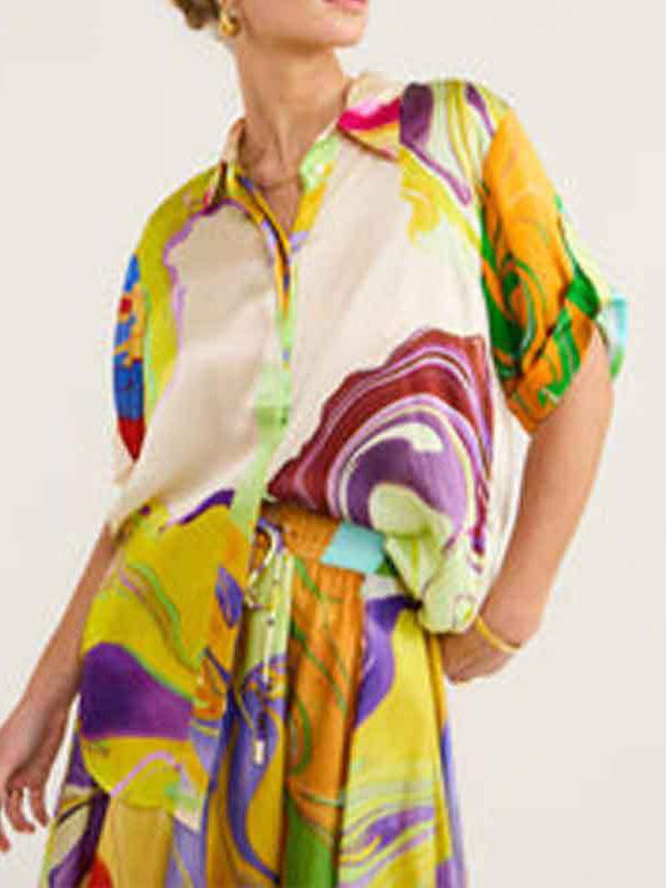 Loose Asymmetric Printed Lapel Blouse + A-Line Drawstring Elasticity Skirt Two Pieces Set Product Image